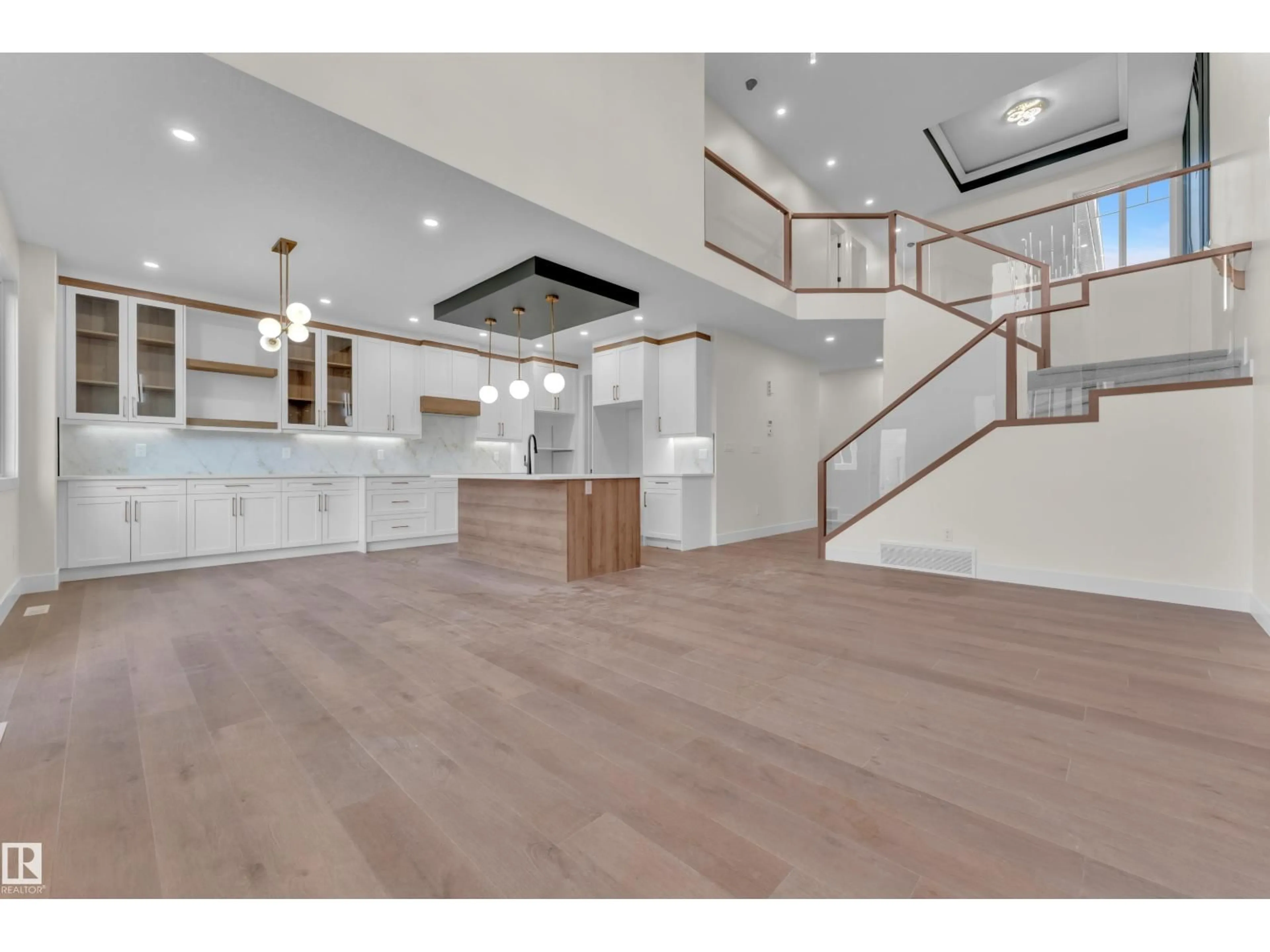 Open concept kitchen, wood/laminate floor for 3602 44 AV, Beaumont Alberta T4X3G8