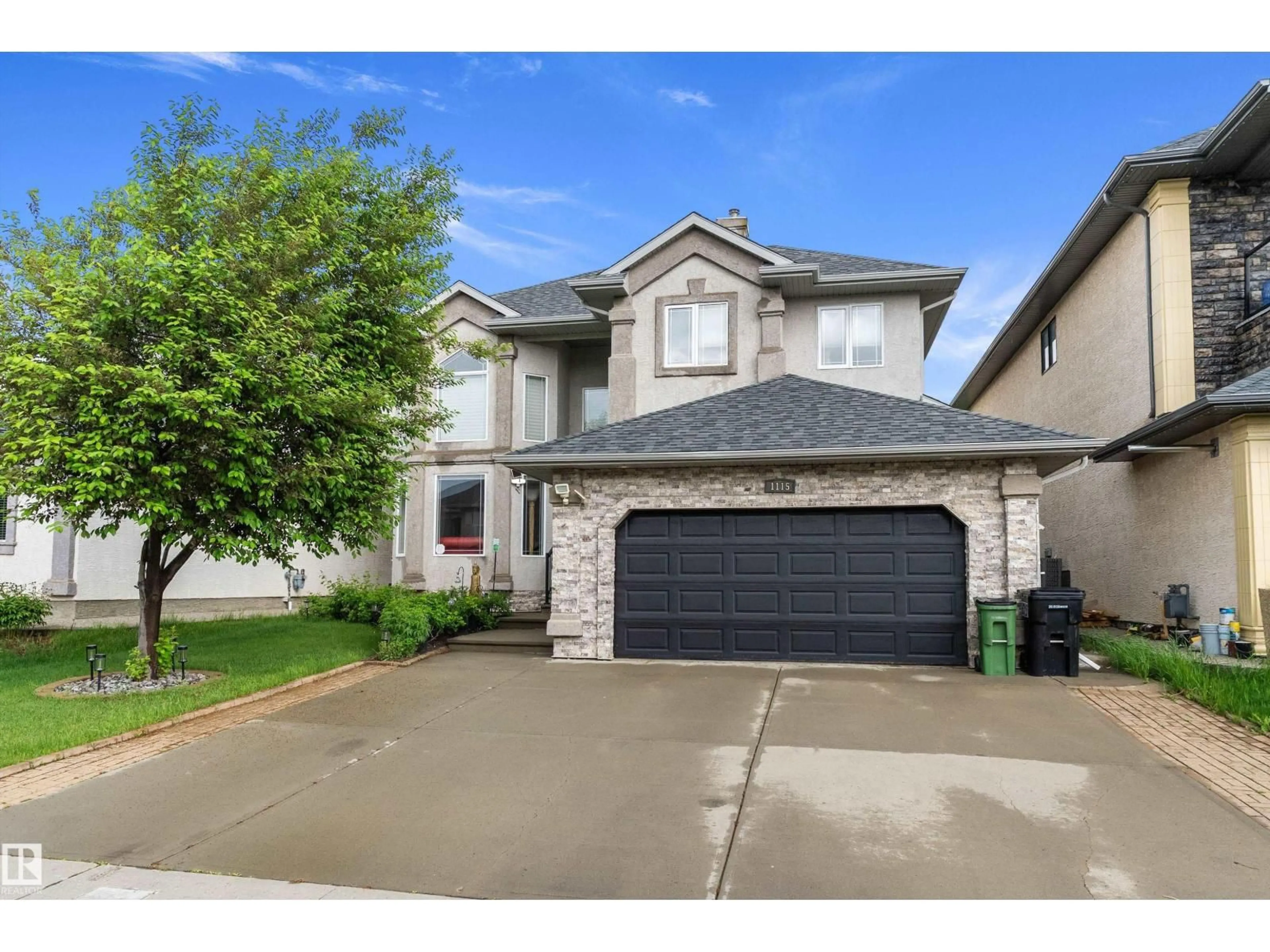 Home with vinyl exterior material, street for SW - 1115 68 ST, Edmonton Alberta T6X1L1