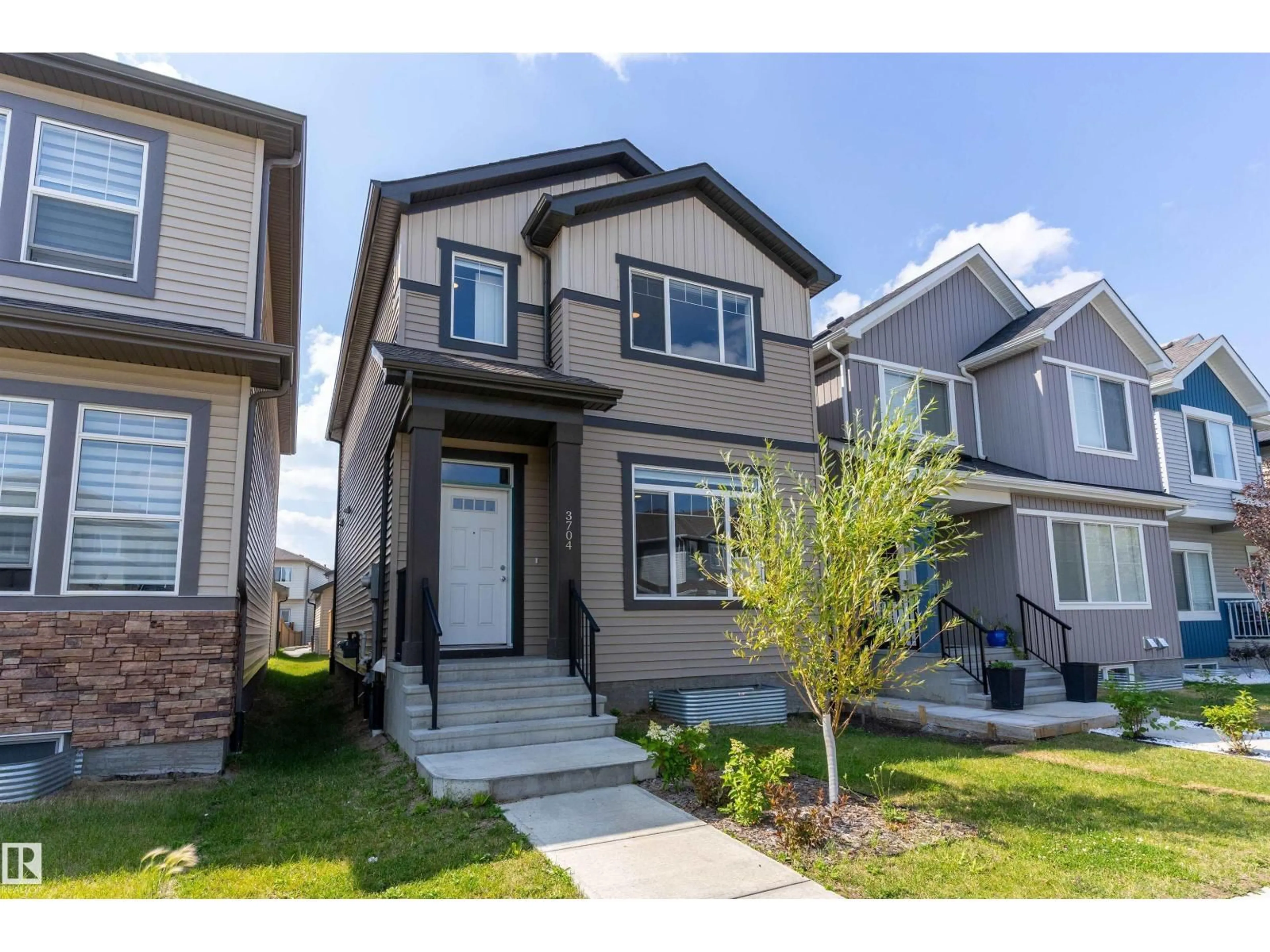 Home with vinyl exterior material, street for 3704 2 ST, Edmonton Alberta T6T2L8
