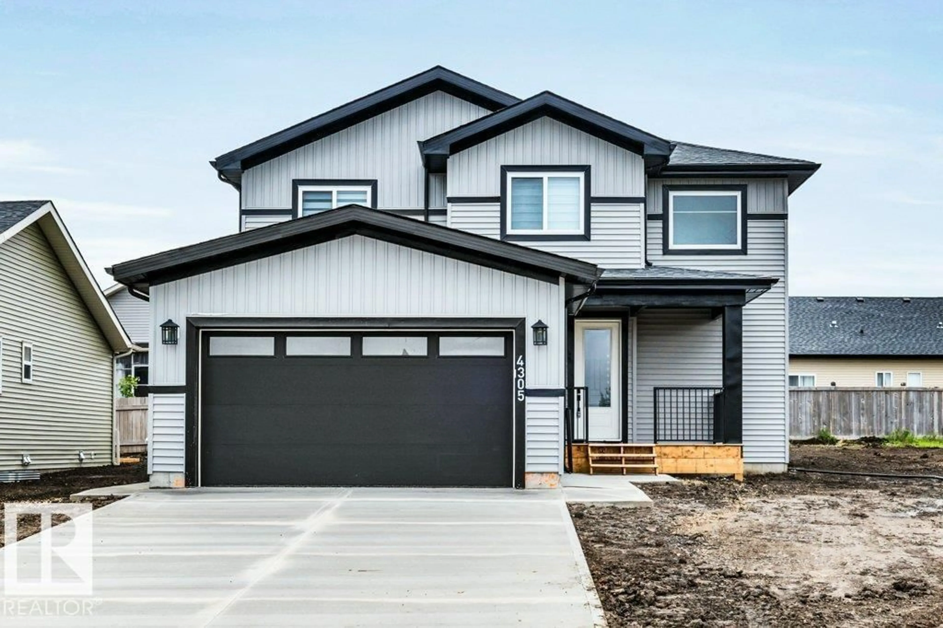 Home with vinyl exterior material, street for 4305 CEDAR DRIVE, Wetaskiwin Alberta T9A0A1