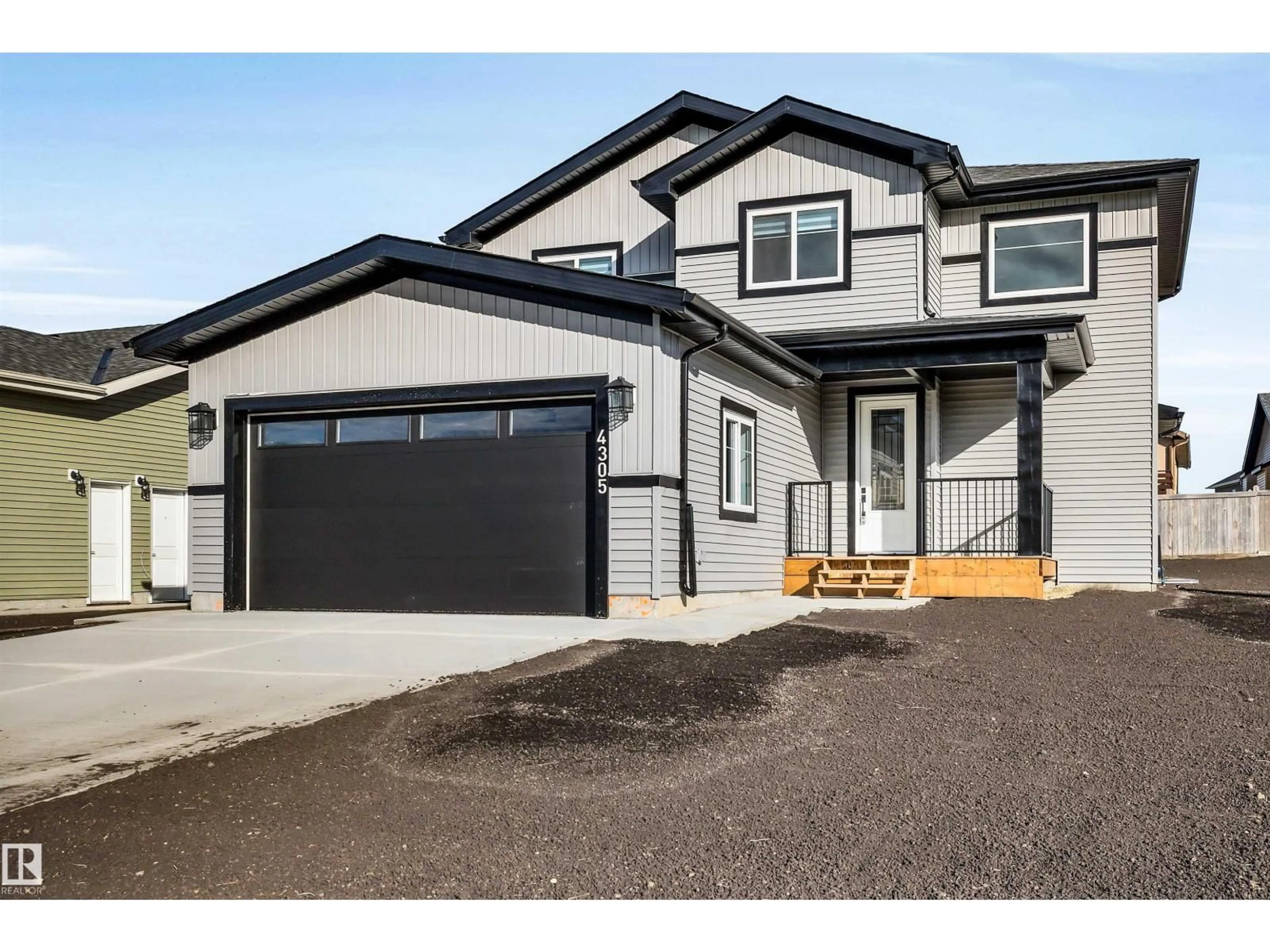 Home with vinyl exterior material, street for 4305 CEDAR DRIVE, Wetaskiwin Alberta T9A0A1