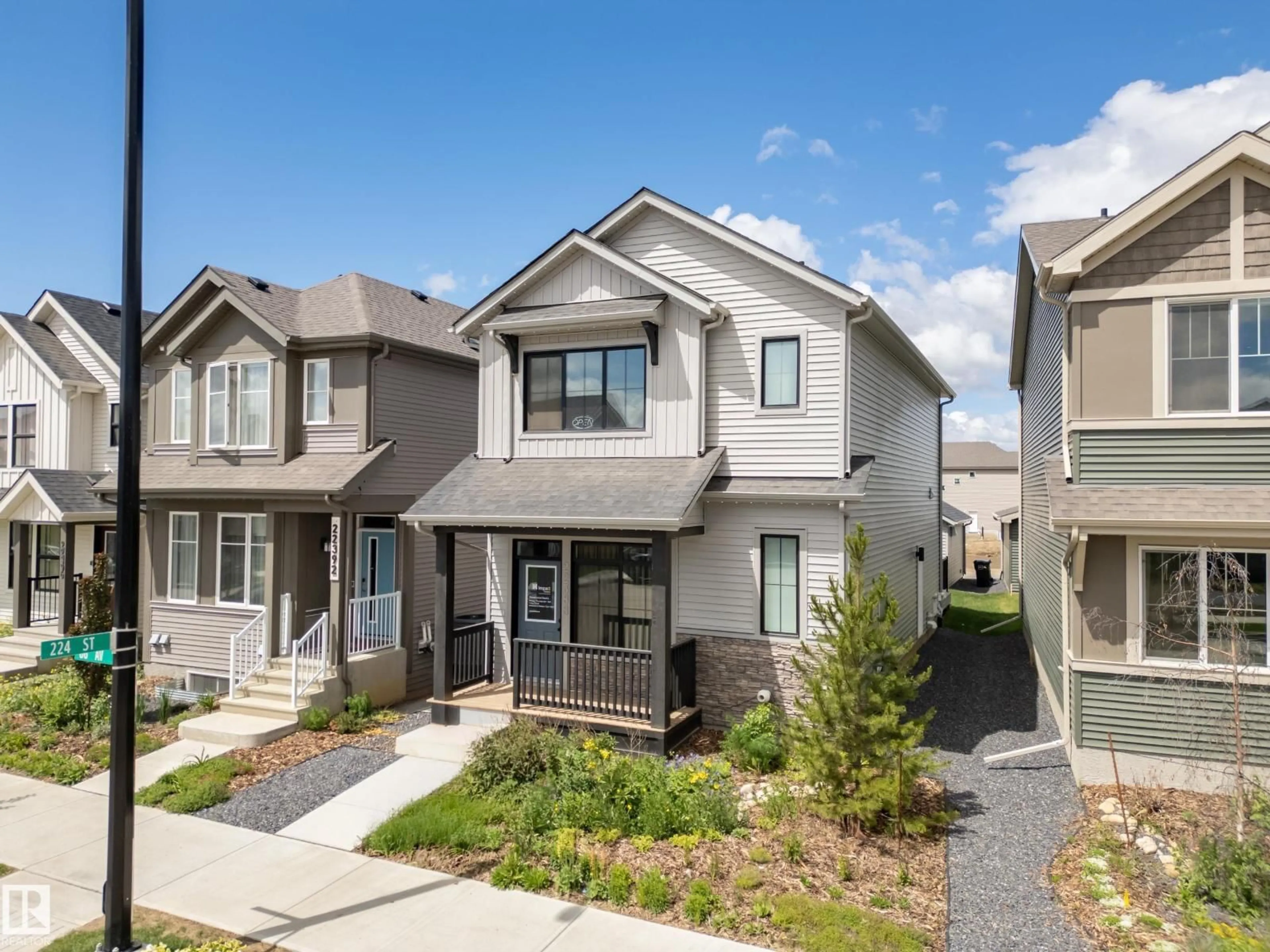 Home with vinyl exterior material, street for 22388 88 AV, Edmonton Alberta T5T7W6