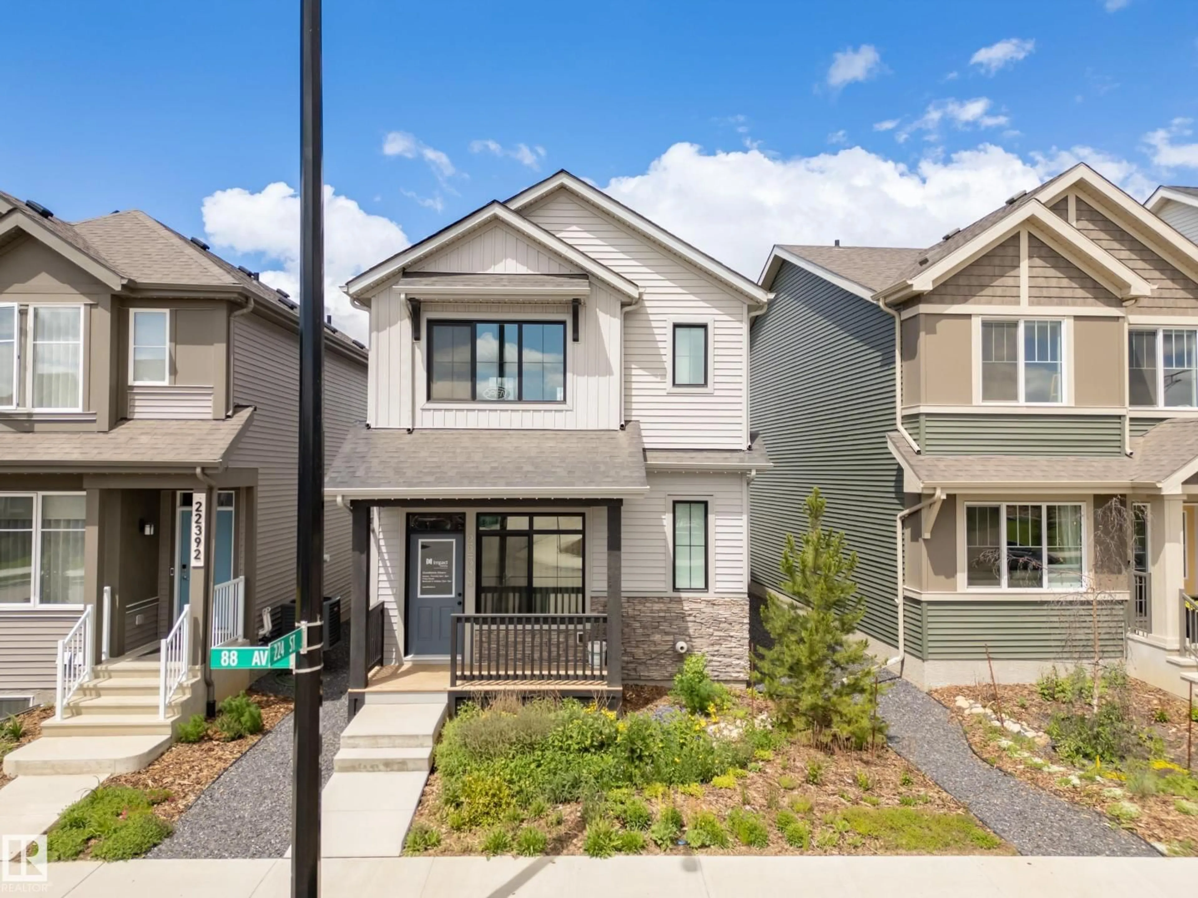 Home with vinyl exterior material, street for 22388 88 AV, Edmonton Alberta T5T7W6