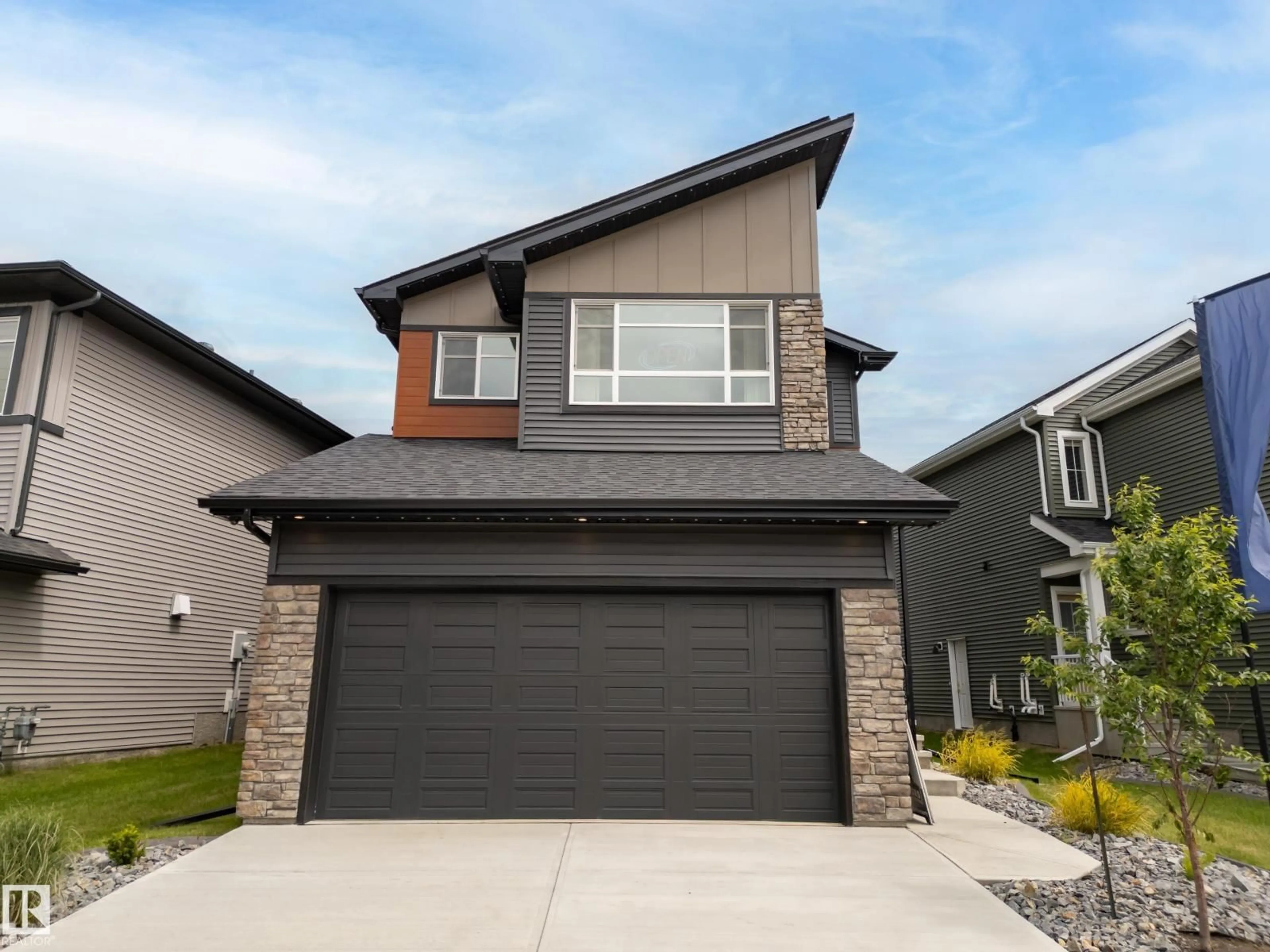 Home with brick exterior material, street for NW - 9307 229 ST, Edmonton Alberta T5T4W8
