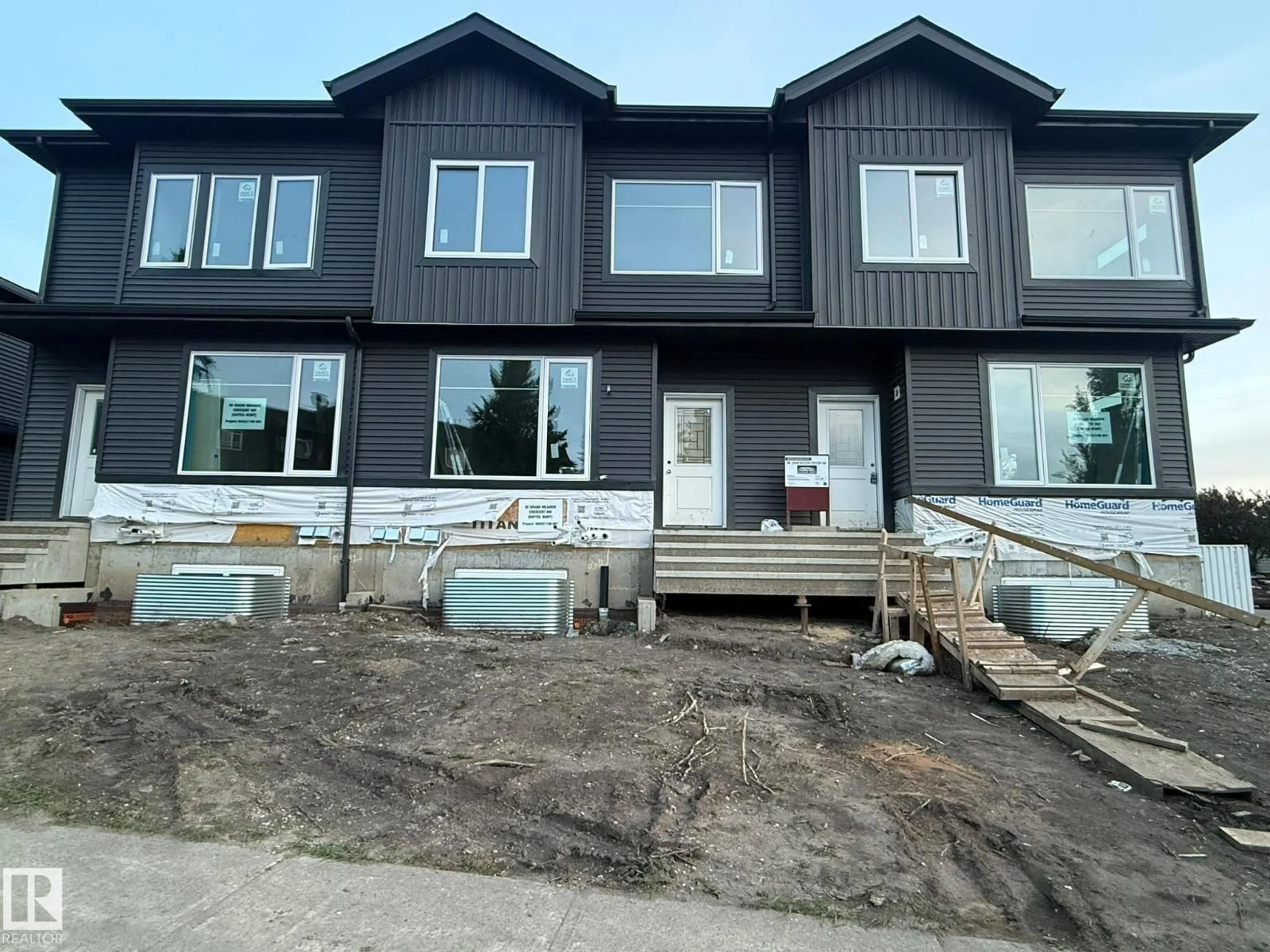 Home with vinyl exterior material, building for 88 GRAND MEADOW CR, Edmonton Alberta T6L1A2