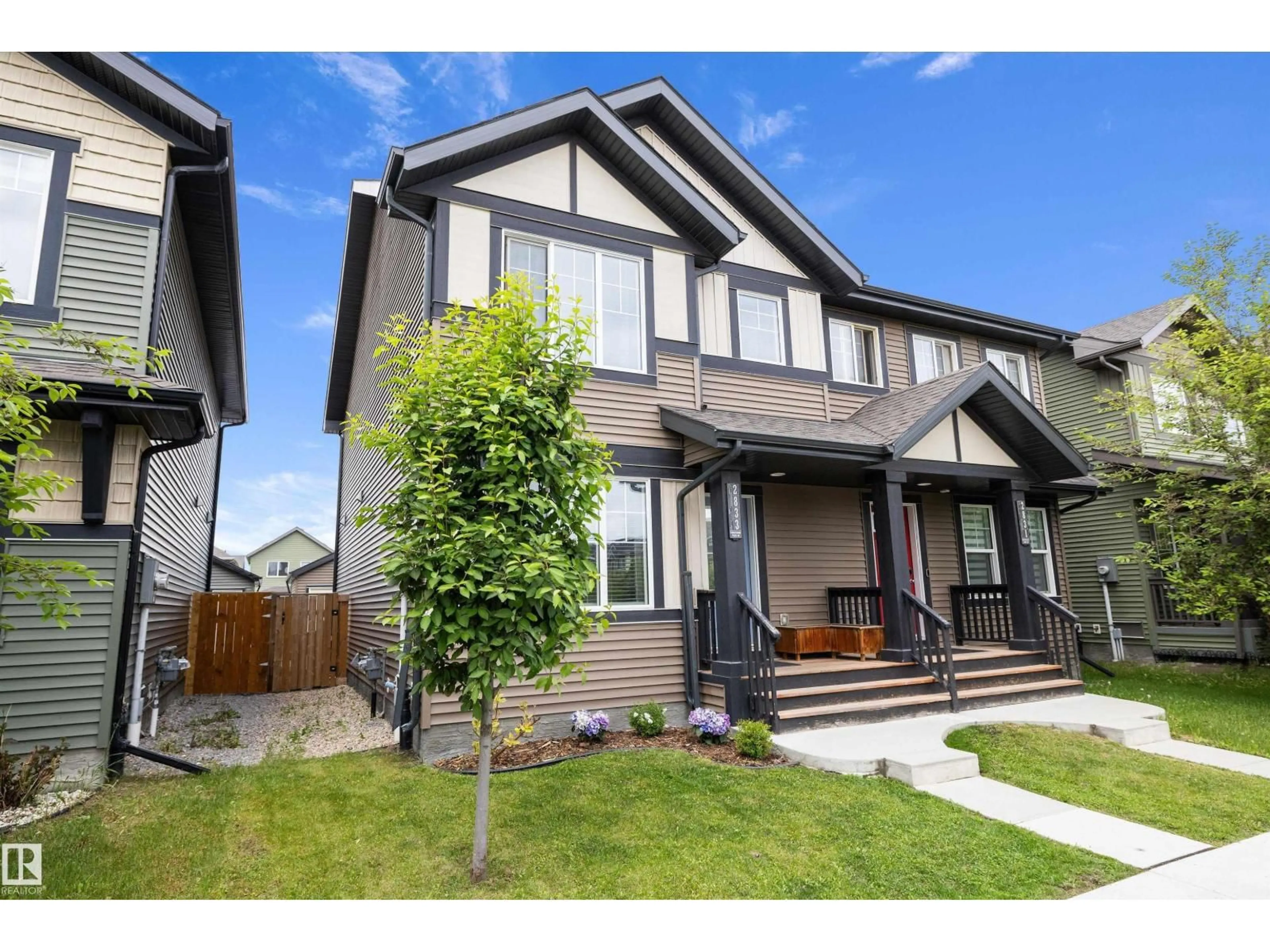 Home with vinyl exterior material, street for 2833 CHOKECHERRY PL, Edmonton Alberta T6X2J8