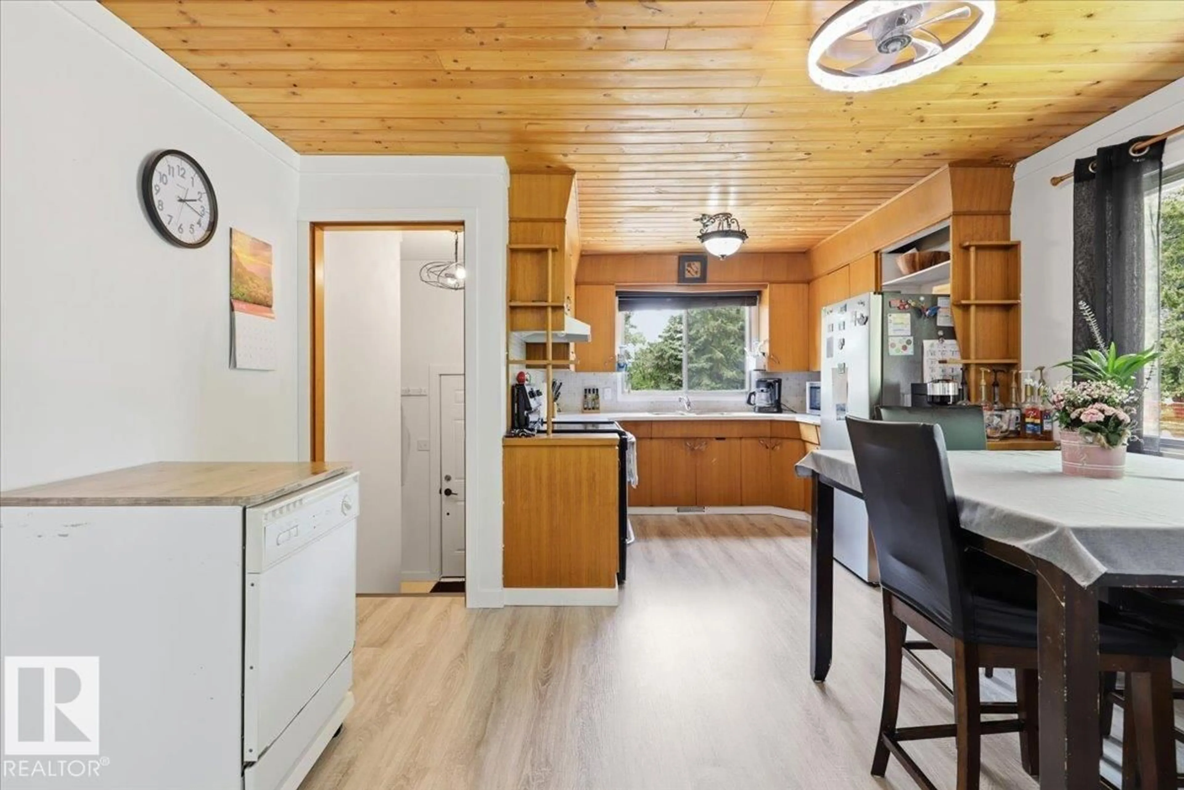 Open concept kitchen, wood/laminate floor for 5234 54 ST, Thorsby Alberta T0C2P0