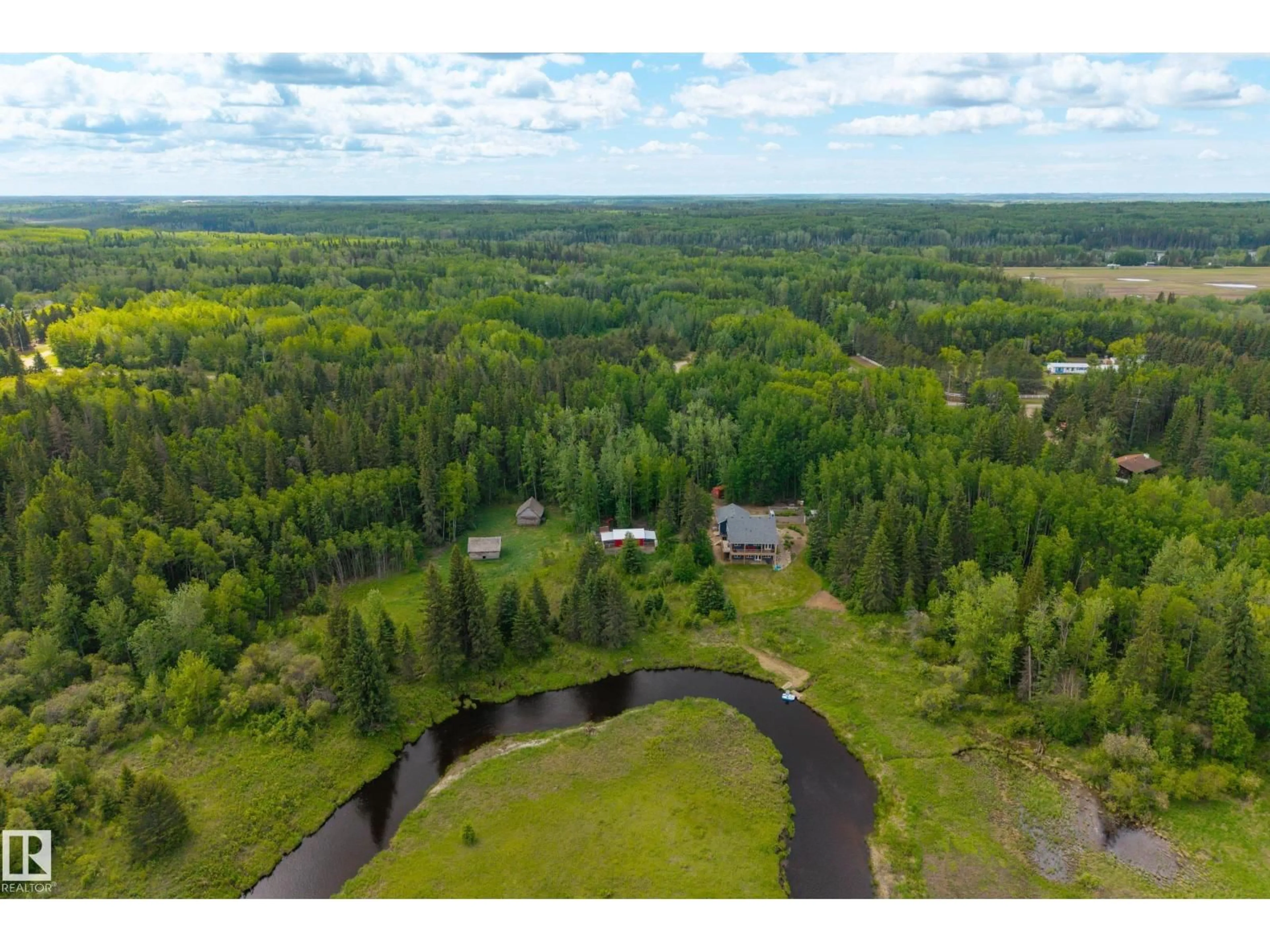 A pic from outside/outdoor area/front of a property/back of a property/a pic from drone, water/lake/river/ocean view for 25 RANGE ROAD 232, Rural Thorhild County Alberta T0A2W0