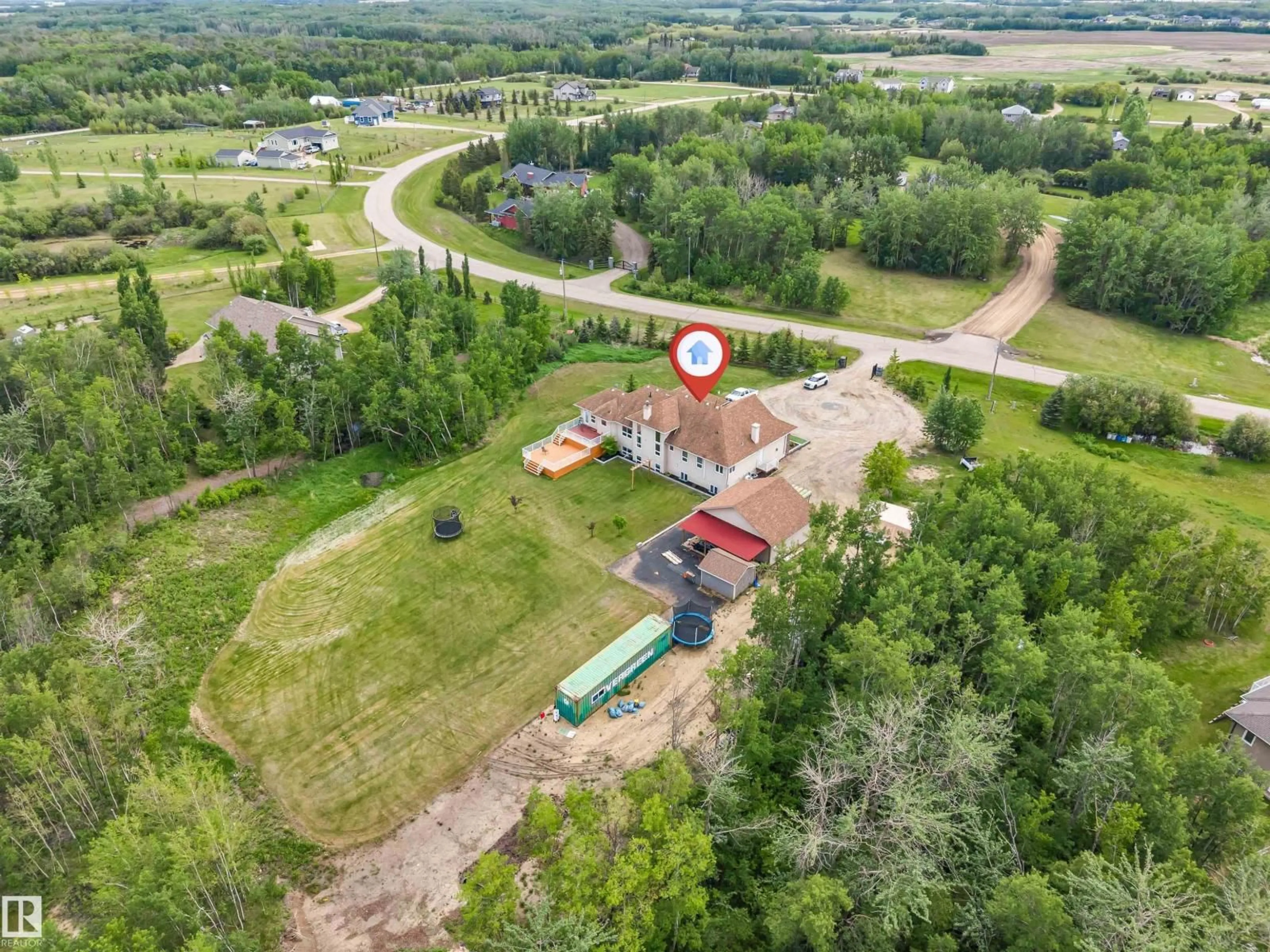 A pic from outside/outdoor area/front of a property/back of a property/a pic from drone, unknown for 330 - 50150 RGE RD 232 NE, Rural Leduc County Alberta T9C1G3