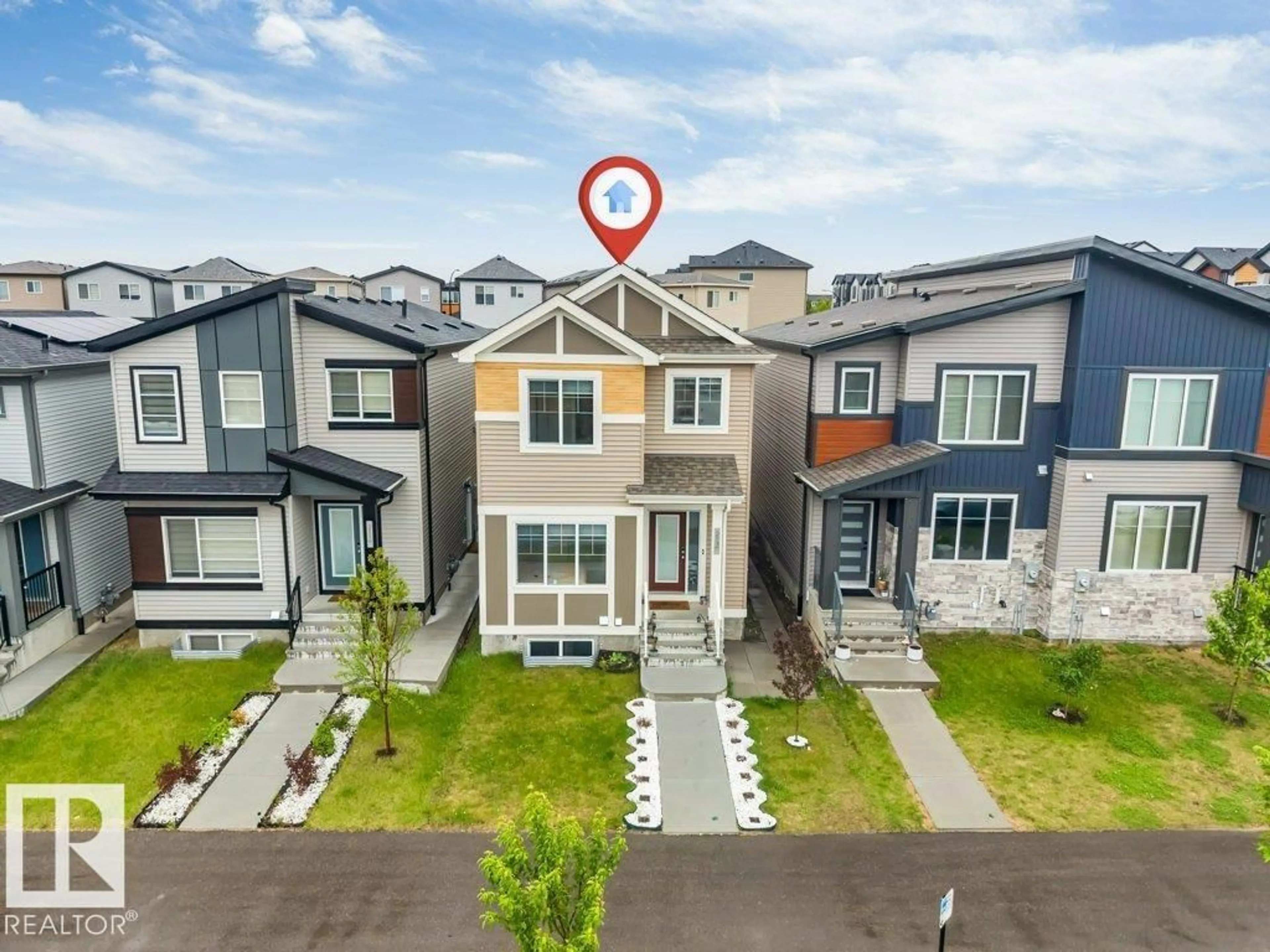 A pic from outside/outdoor area/front of a property/back of a property/a pic from drone, street for 213 CHARLESWORTH DR, Edmonton Alberta T6X2W2