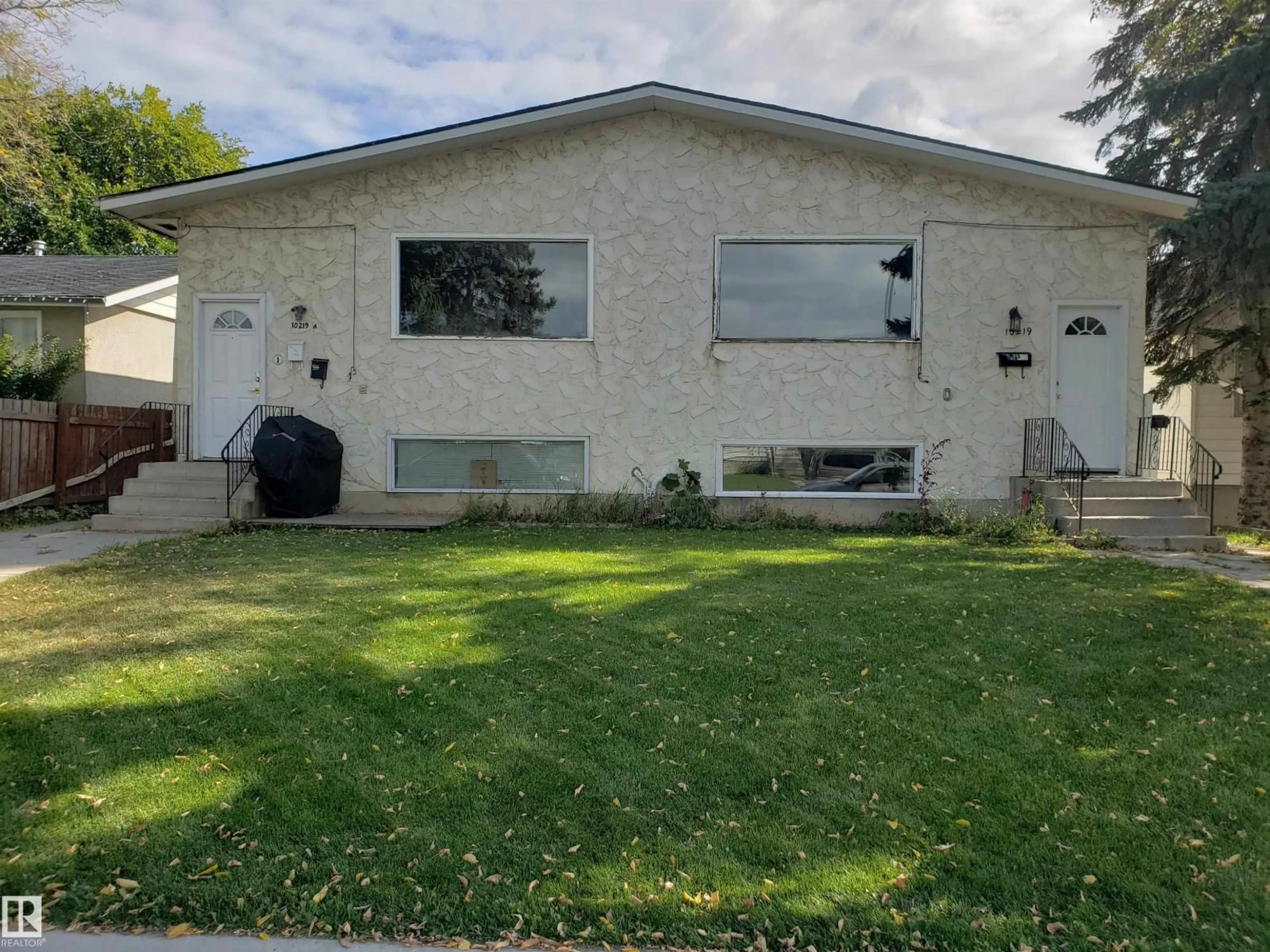 Home with vinyl exterior material, street for NW - 10219 155 ST, Edmonton Alberta T5P2L8