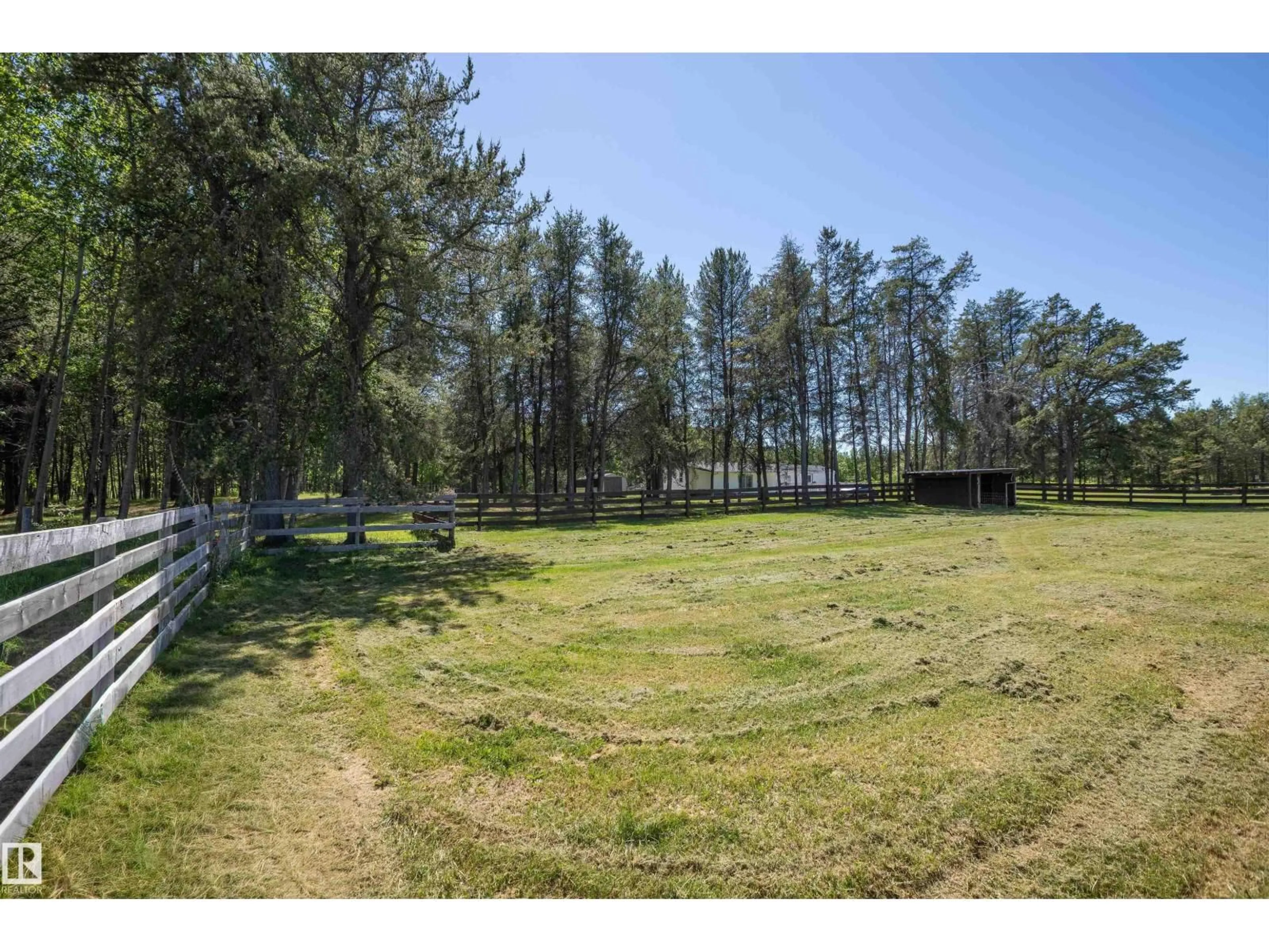 A pic from outside/outdoor area/front of a property/back of a property/a pic from drone, water/lake/river/ocean view for 59327 RR 234, Rural Westlock County Alberta T0G0P0