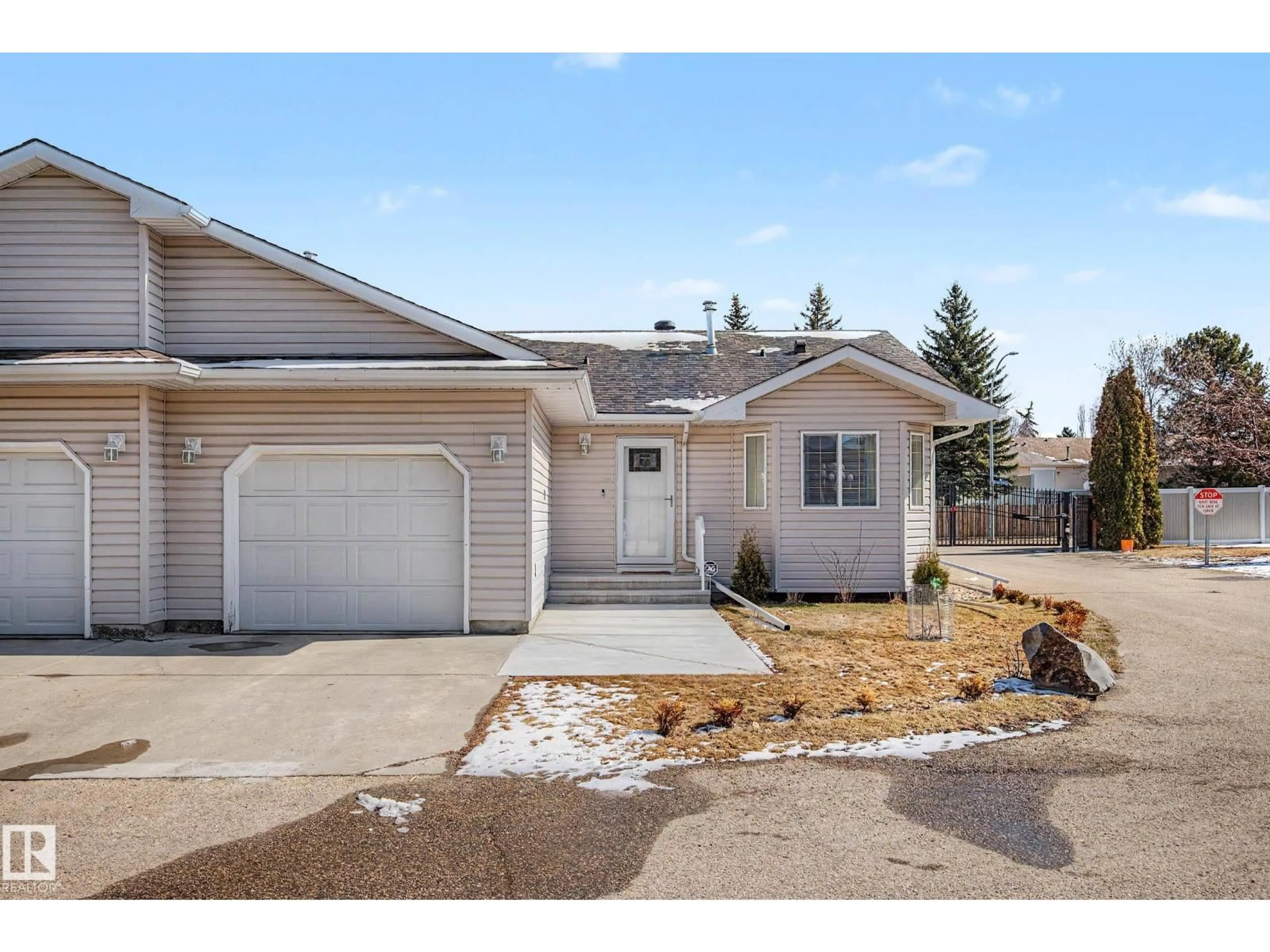 Home with vinyl exterior material, street for #21 - 1850 MILL WOODS RD, Edmonton Alberta T6L7C6