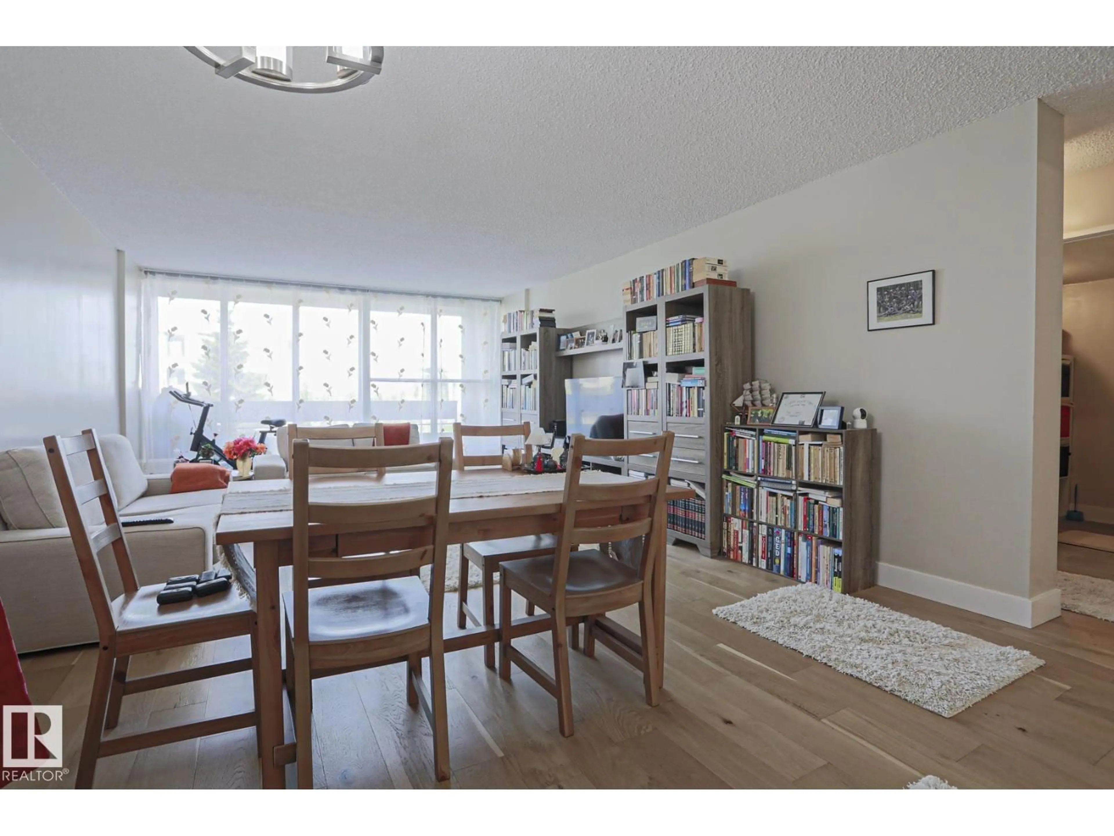 Dining room, wood/laminate floor for #20 - 8735 165 ST, Edmonton Alberta T5R2R6