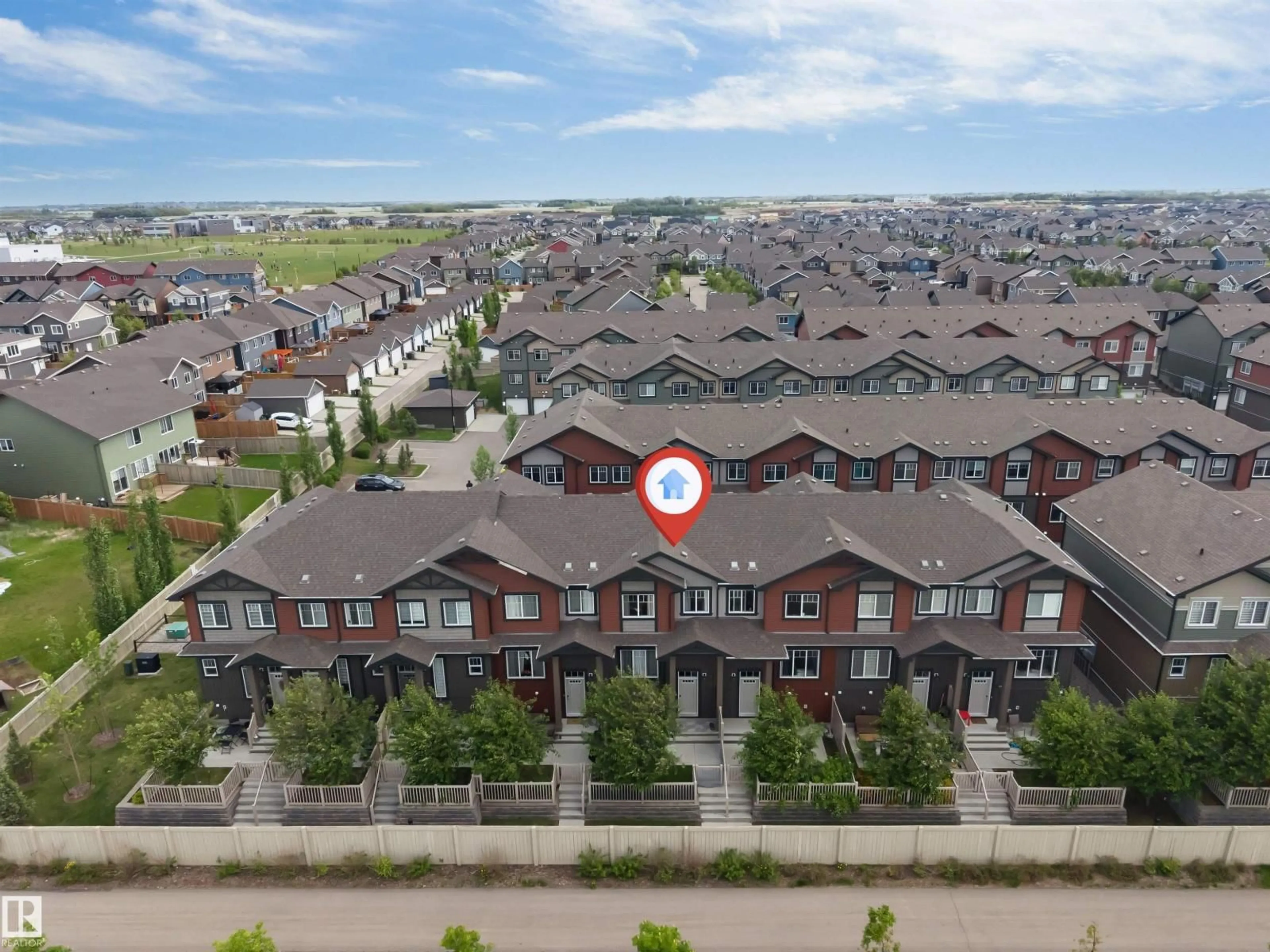 A pic from outside/outdoor area/front of a property/back of a property/a pic from drone, unknown for #116 - 3305 ORCHARDS LI, Edmonton Alberta T6X2H1