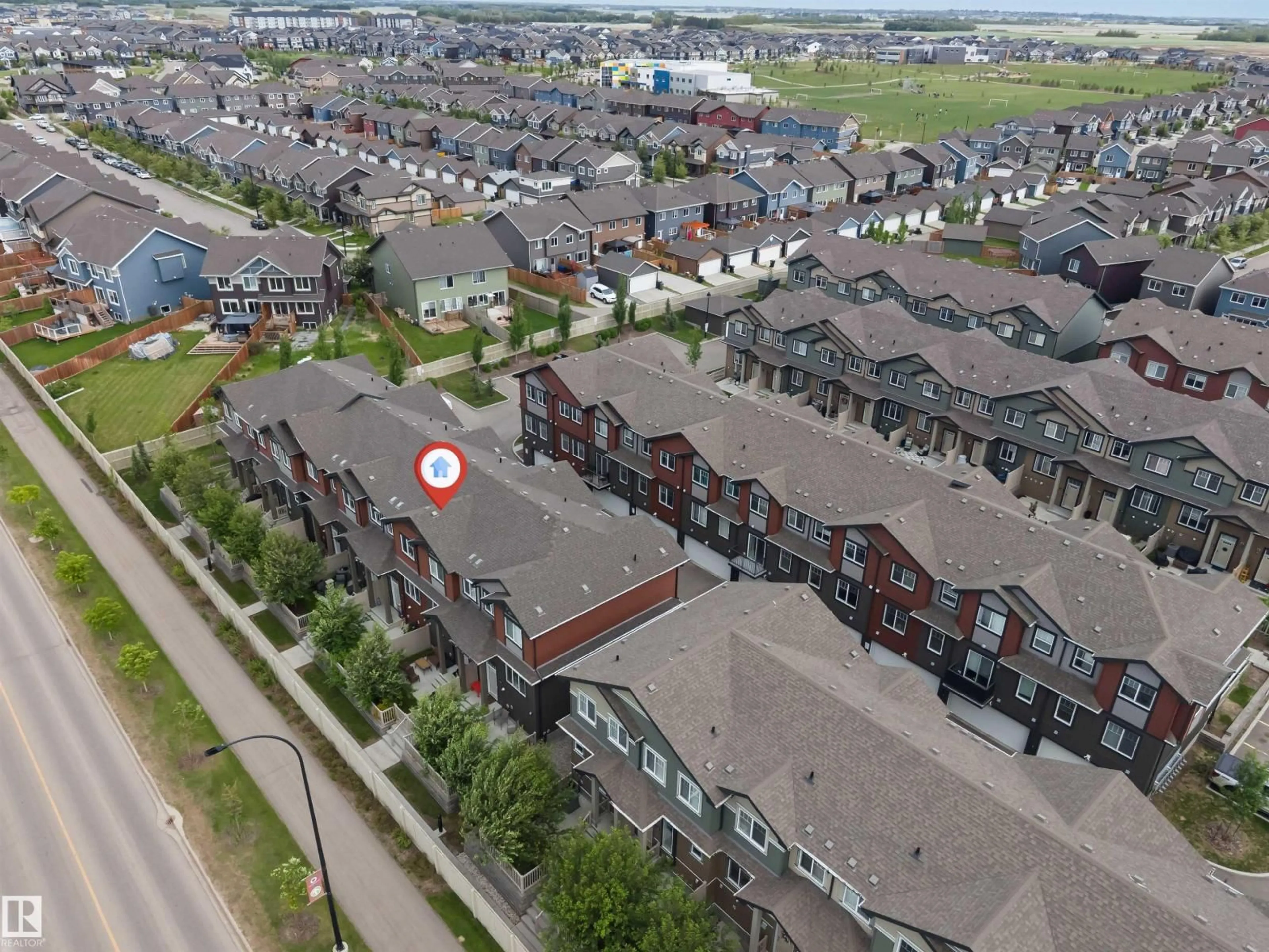A pic from outside/outdoor area/front of a property/back of a property/a pic from drone, city buildings view from balcony for #116 - 3305 ORCHARDS LI, Edmonton Alberta T6X2H1