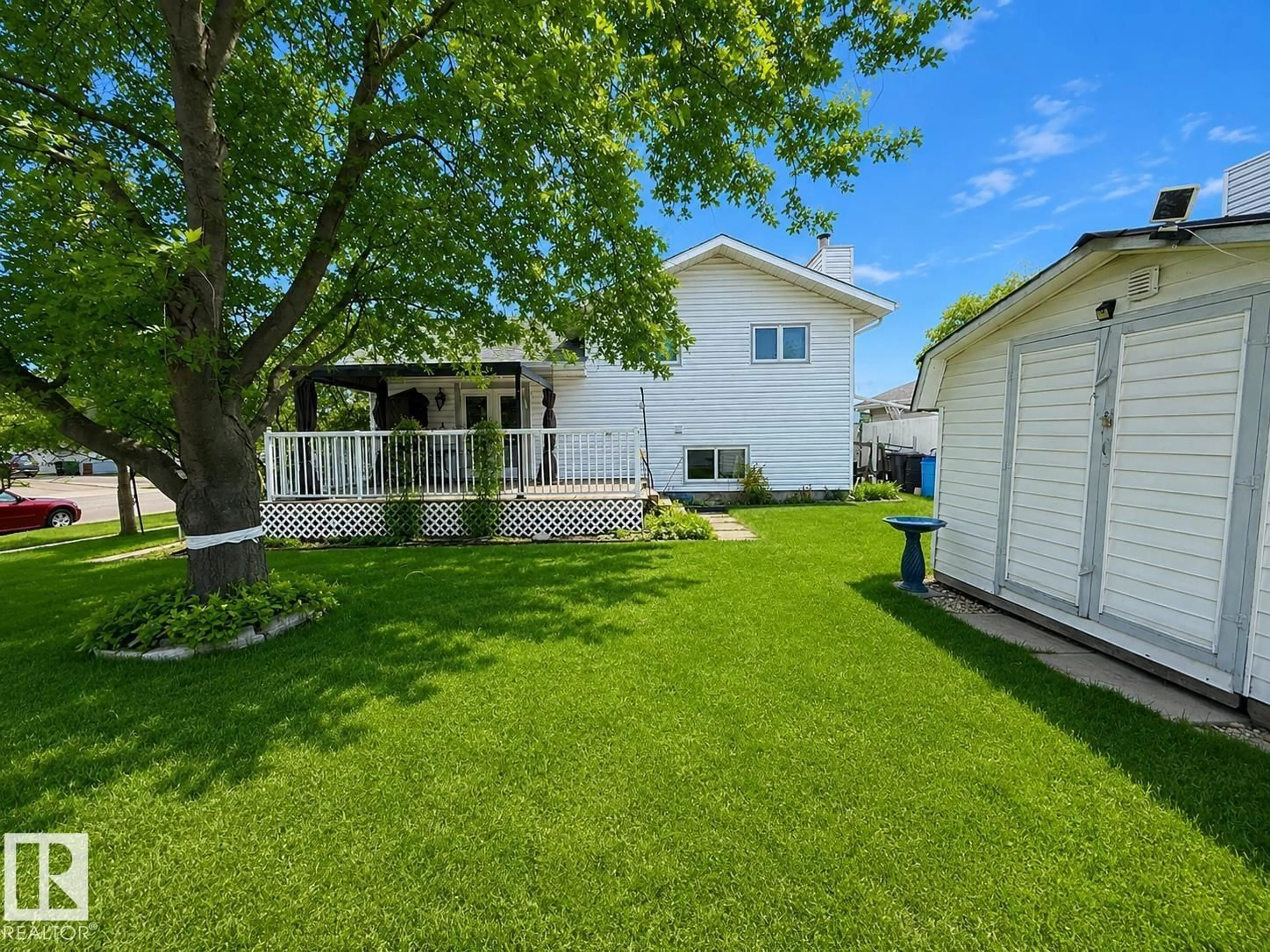 A pic from outside/outdoor area/front of a property/back of a property/a pic from drone, street for 1 MUNRO CO, Leduc Alberta T9E6N6
