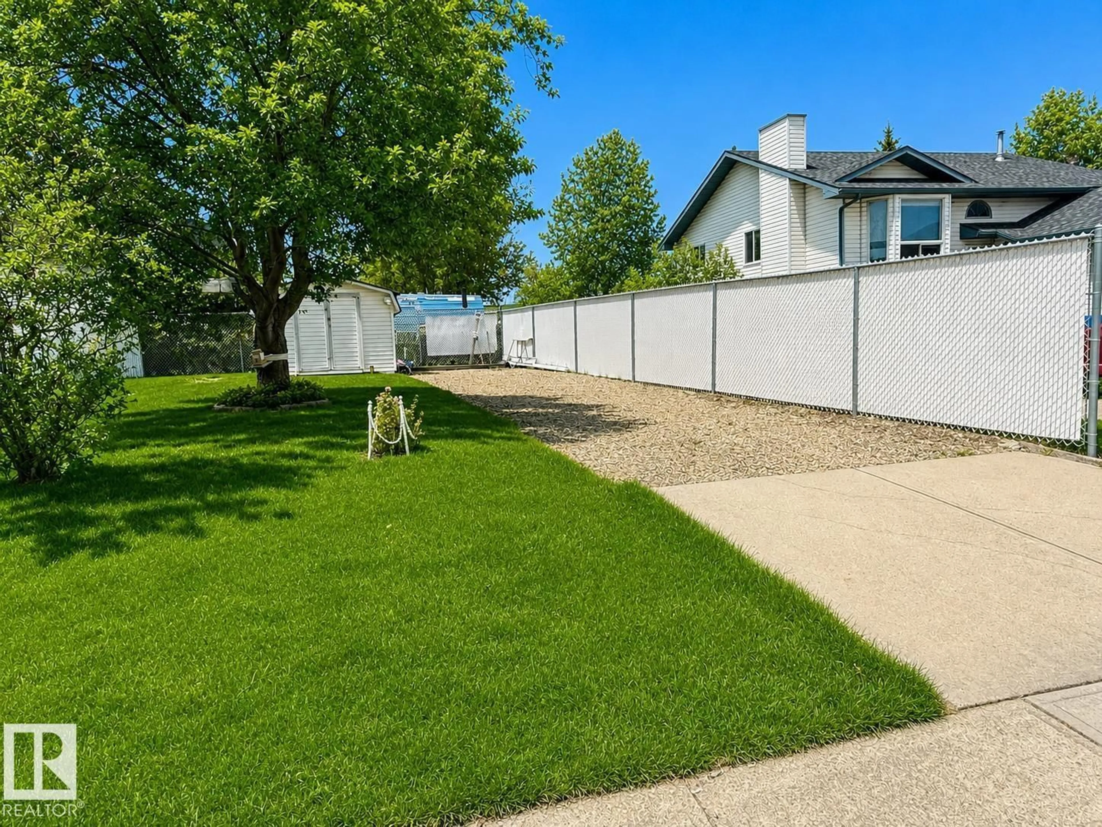 A pic from outside/outdoor area/front of a property/back of a property/a pic from drone, street for 1 MUNRO CO, Leduc Alberta T9E6N6