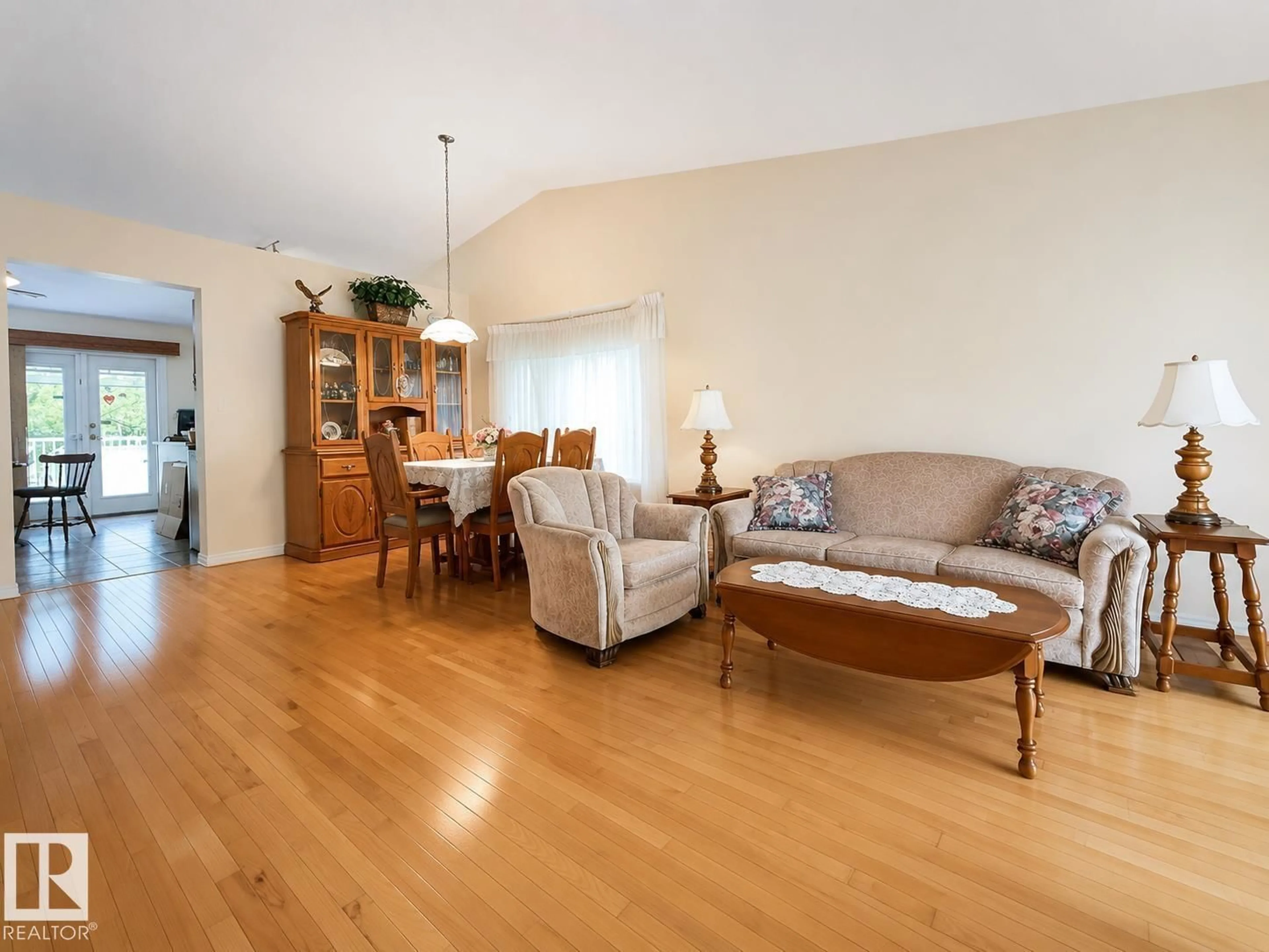 Living room with furniture, wood/laminate floor for 1 MUNRO CO, Leduc Alberta T9E6N6