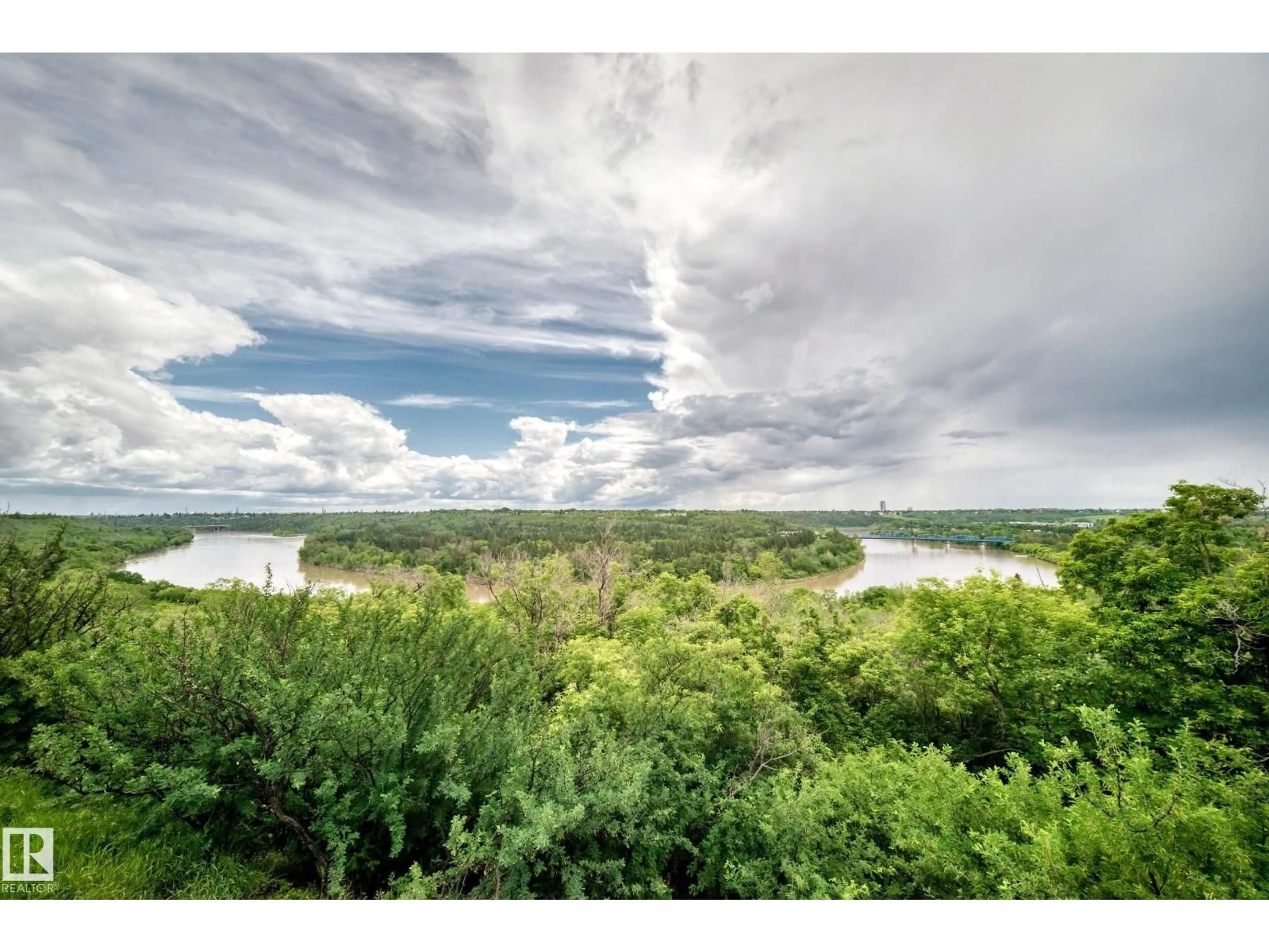 A pic from outside/outdoor area/front of a property/back of a property/a pic from drone, water/lake/river/ocean view for 8310 - 505 JASPER AV, Edmonton Alberta T5H3S3