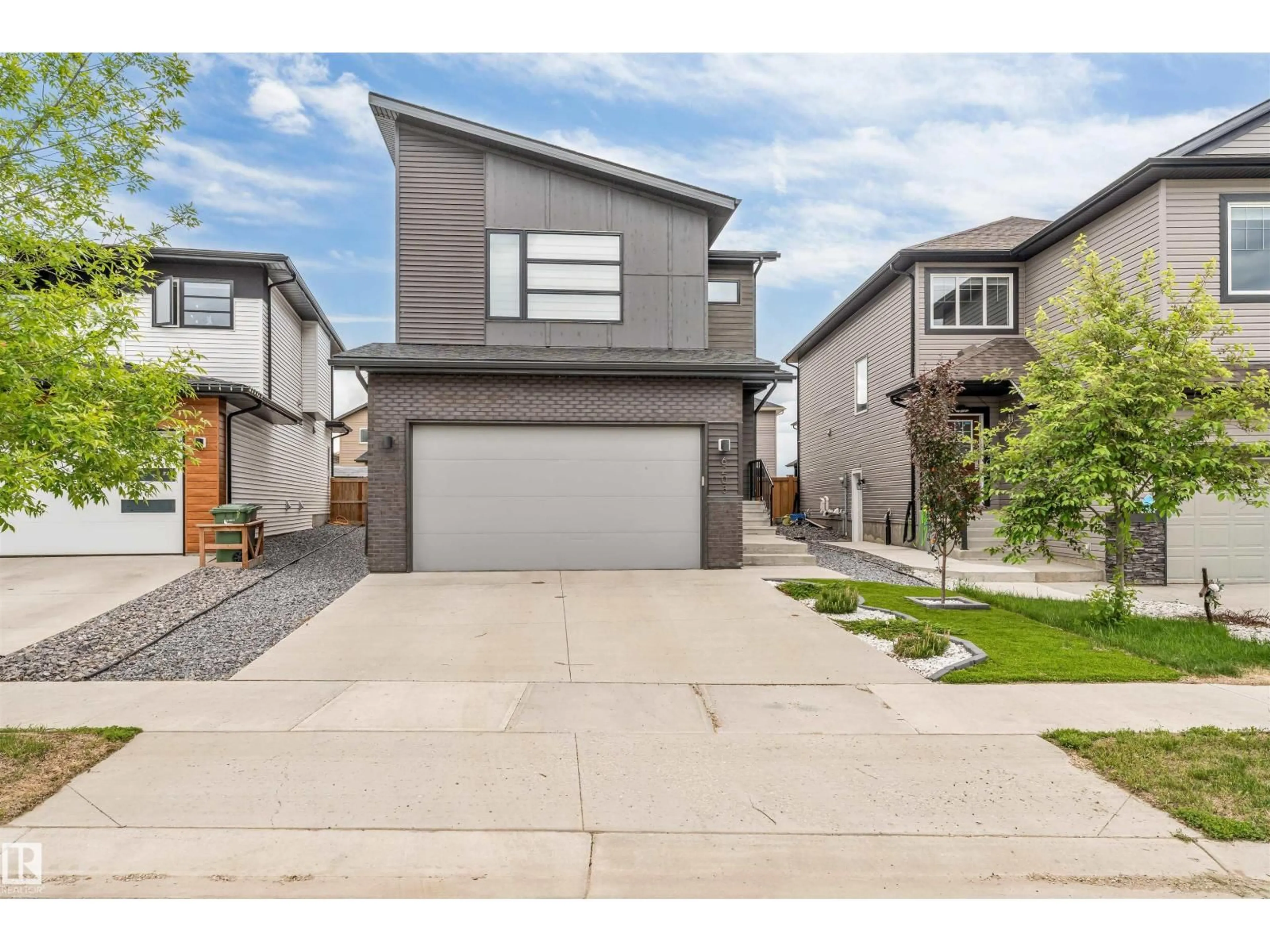 Home with vinyl exterior material, street for 6203 47 AV, Beaumont Alberta T4X0G7