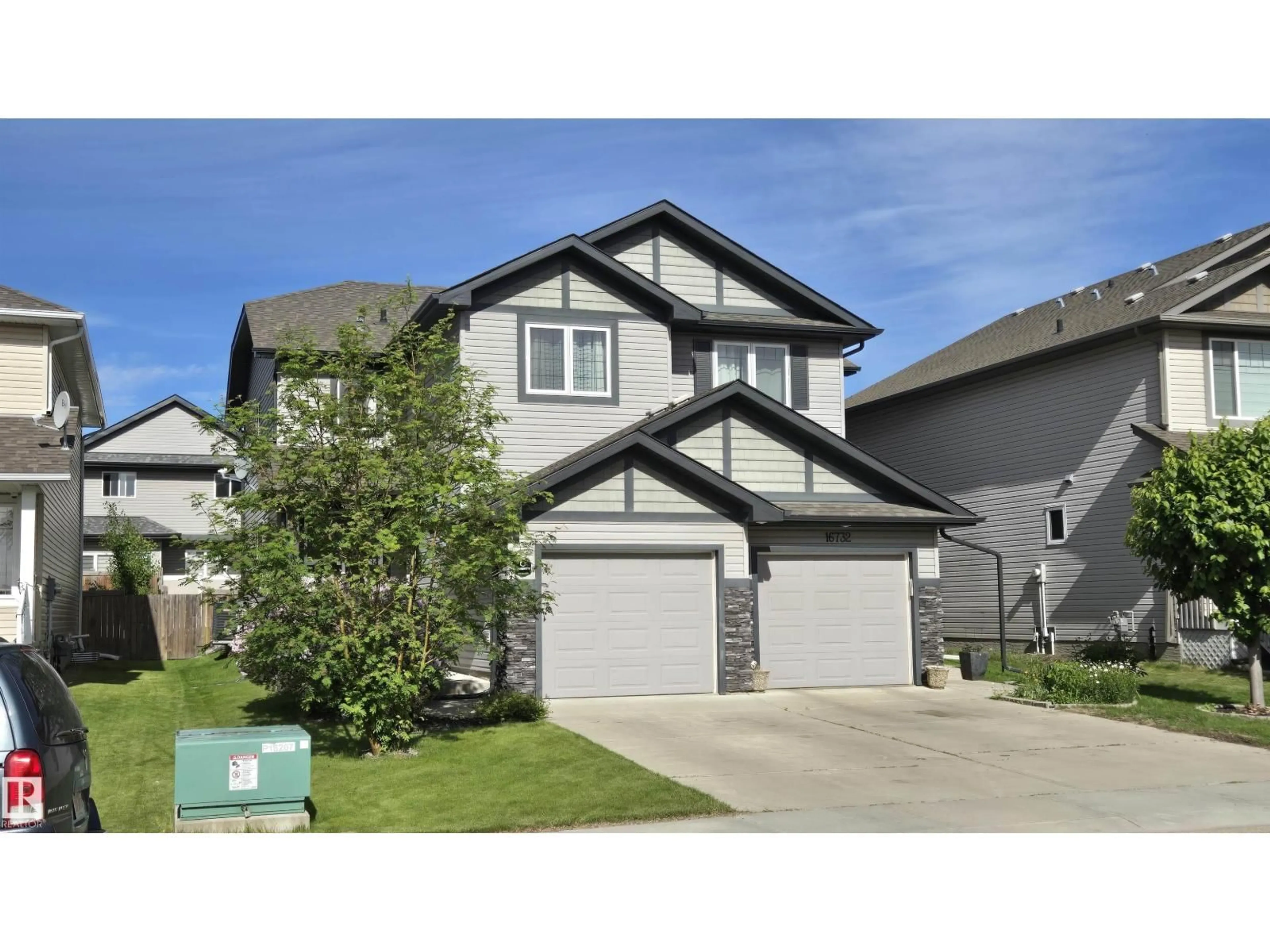 Home with vinyl exterior material, street for NW - 16730 53 ST, Edmonton Alberta T5Y0R6