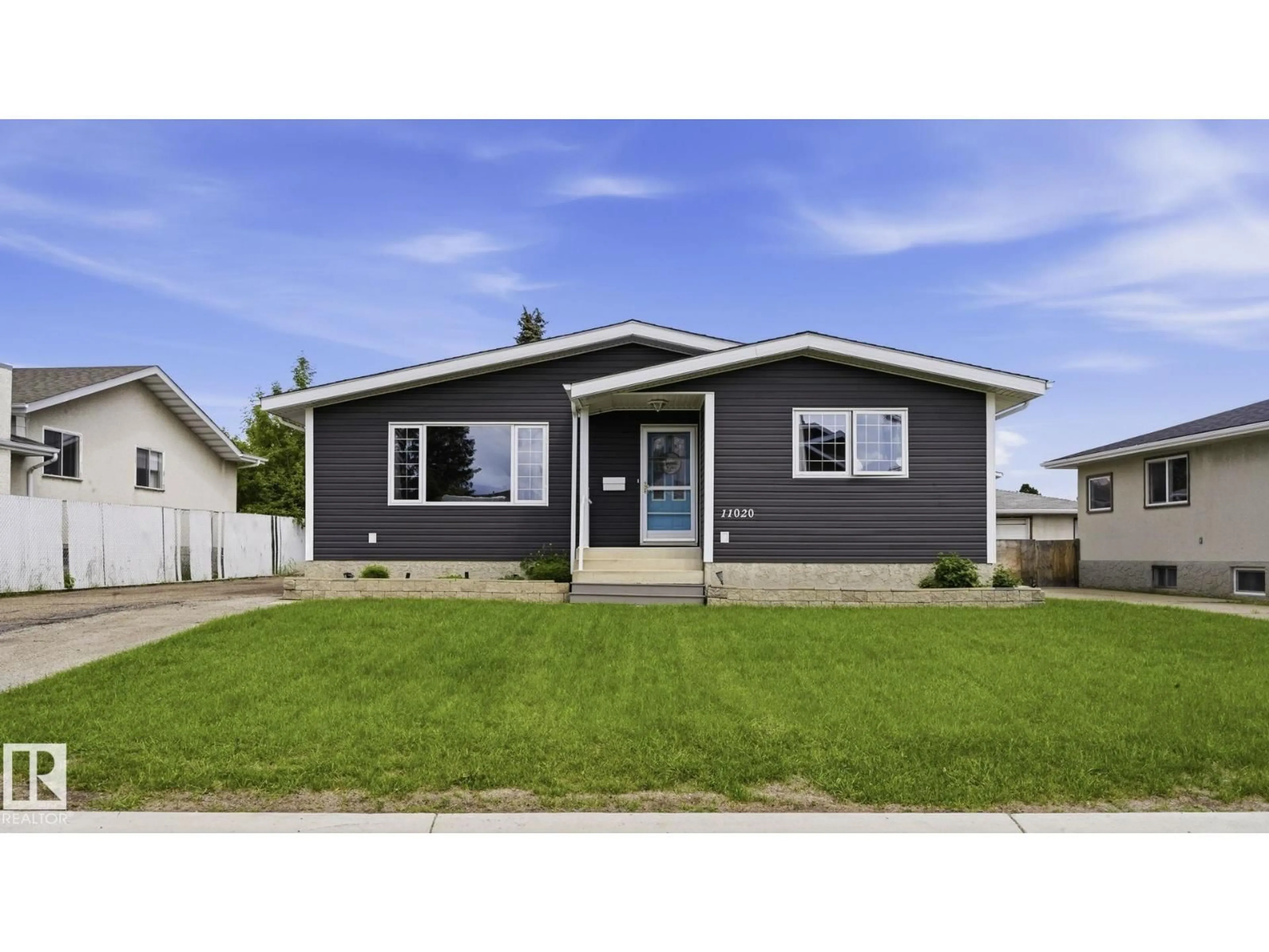 Home with vinyl exterior material, street for 11020 162A AV, Edmonton Alberta T5X2A1