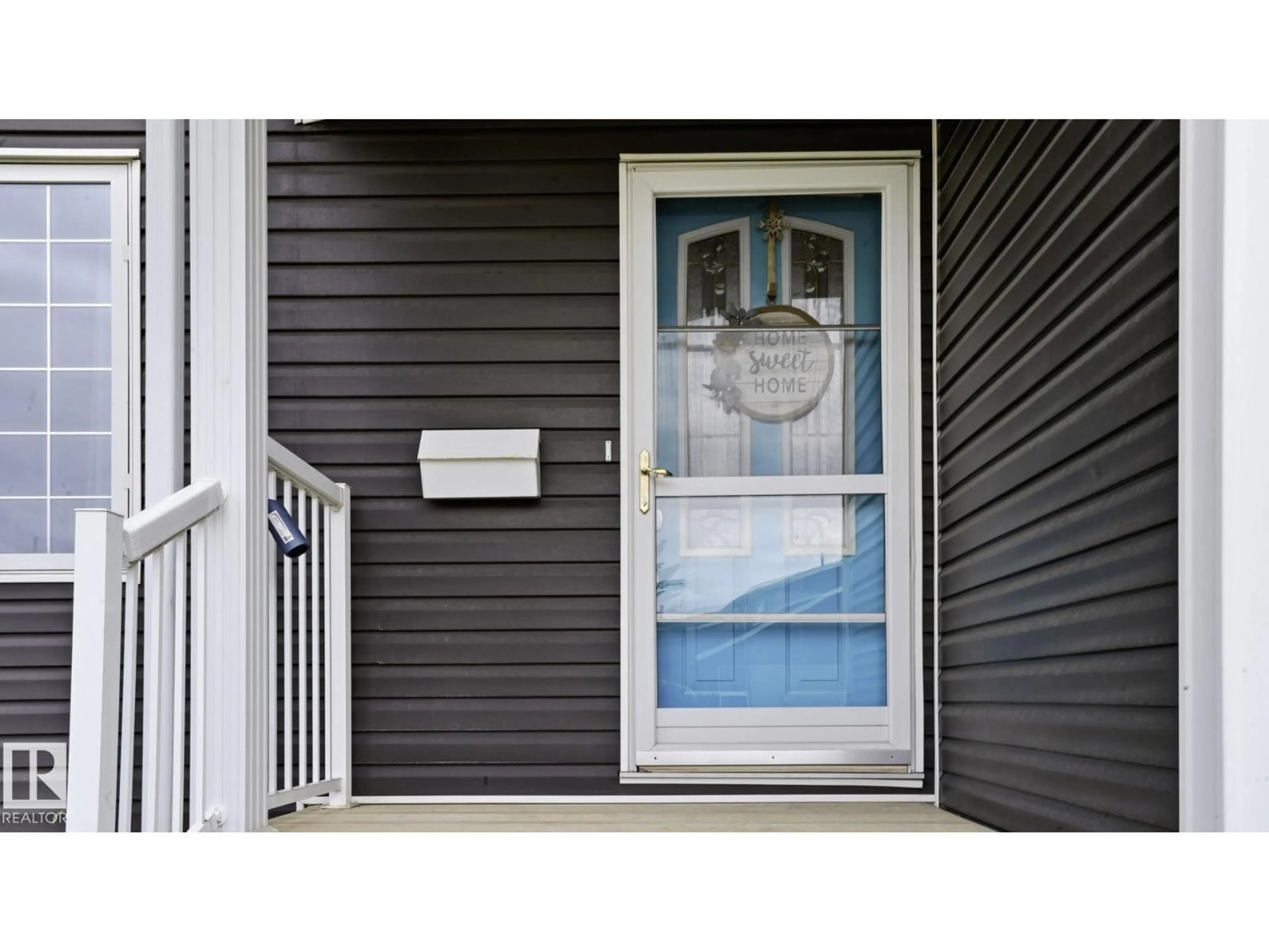 Home with vinyl exterior material, street for 11020 162A AV, Edmonton Alberta T5X2A1
