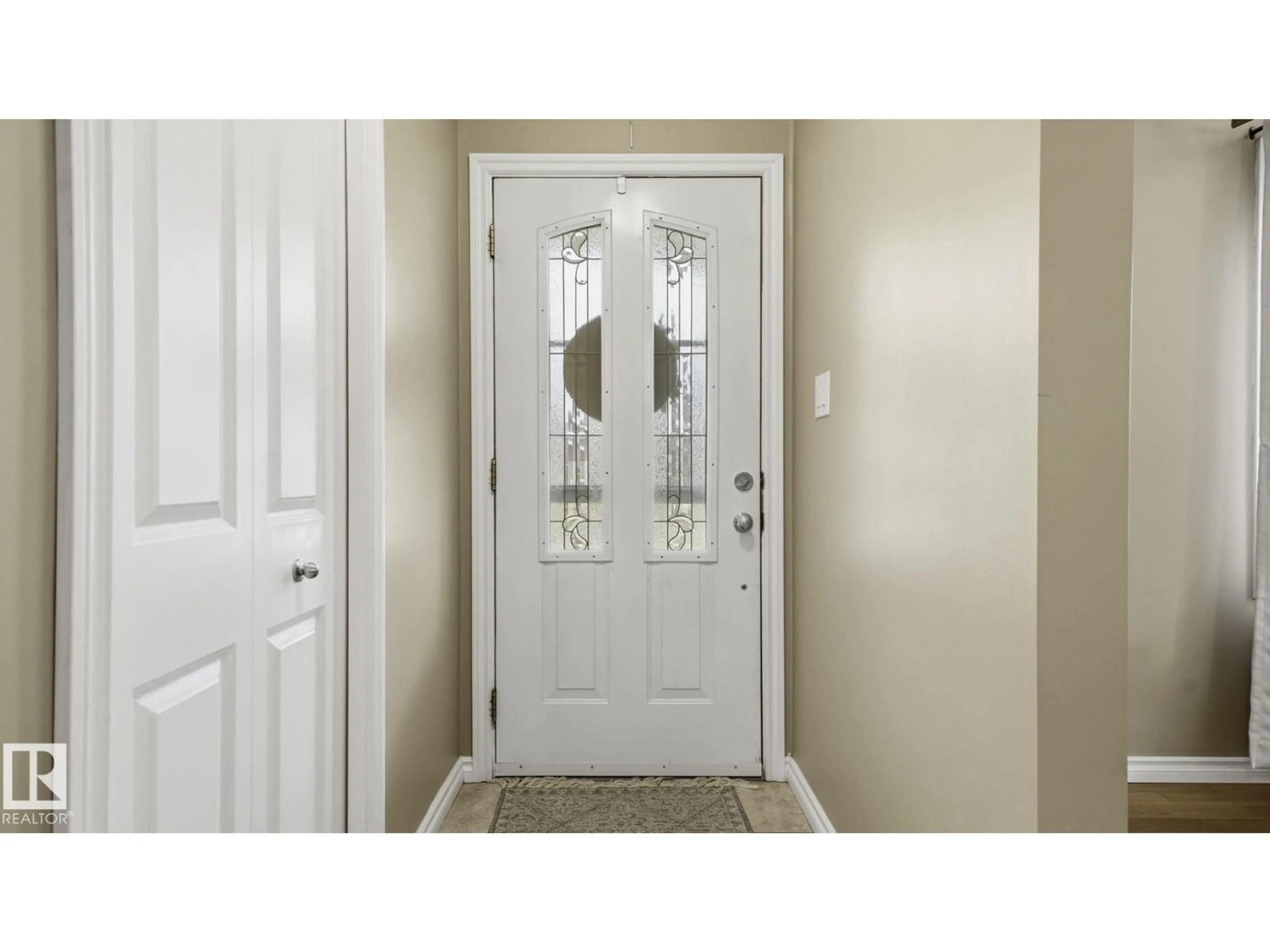 Indoor entryway for 11020 162A AV, Edmonton Alberta T5X2A1