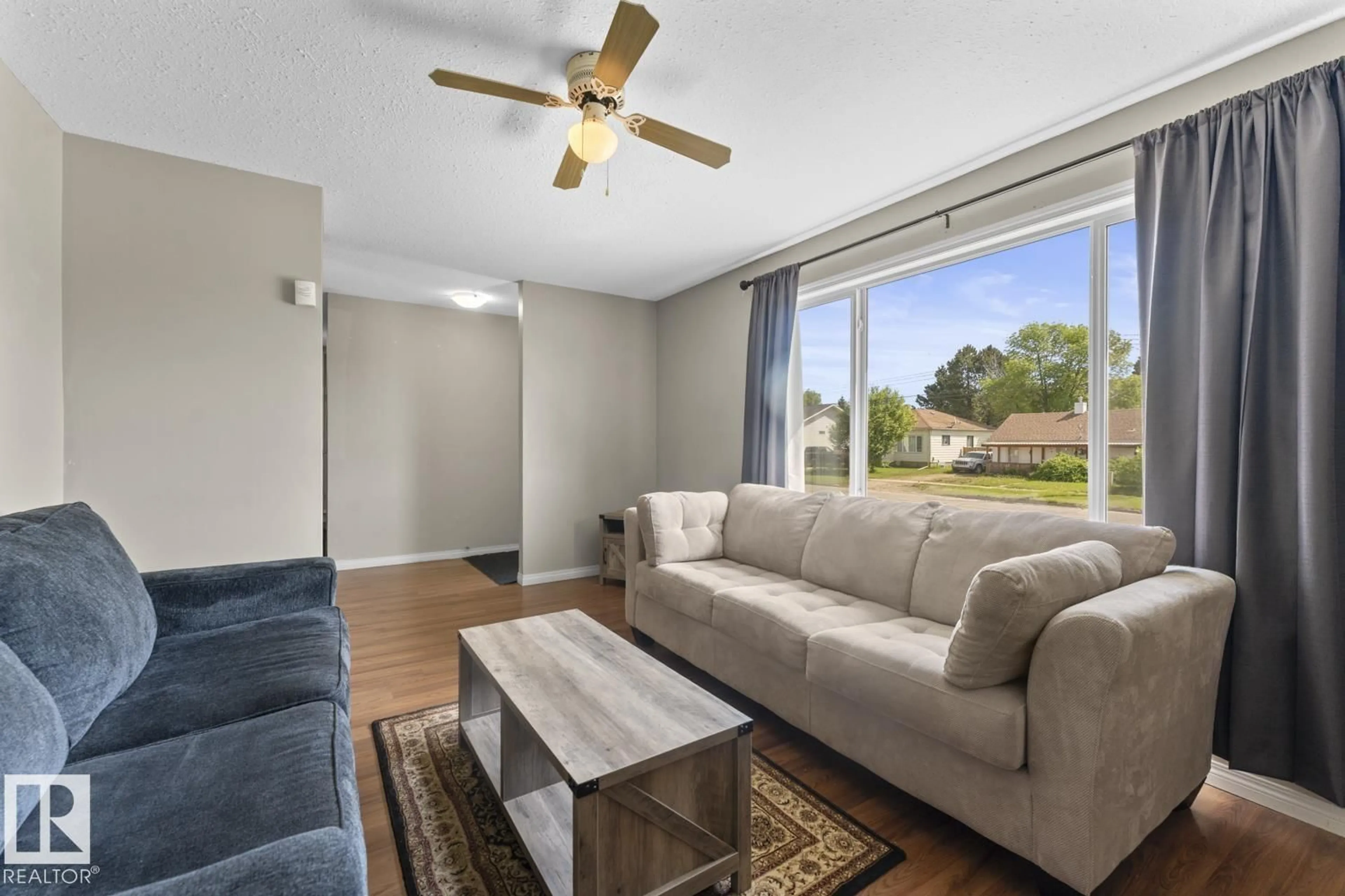 Living room with furniture, unknown for 1211 8 ST, Cold Lake Alberta T9M1J7