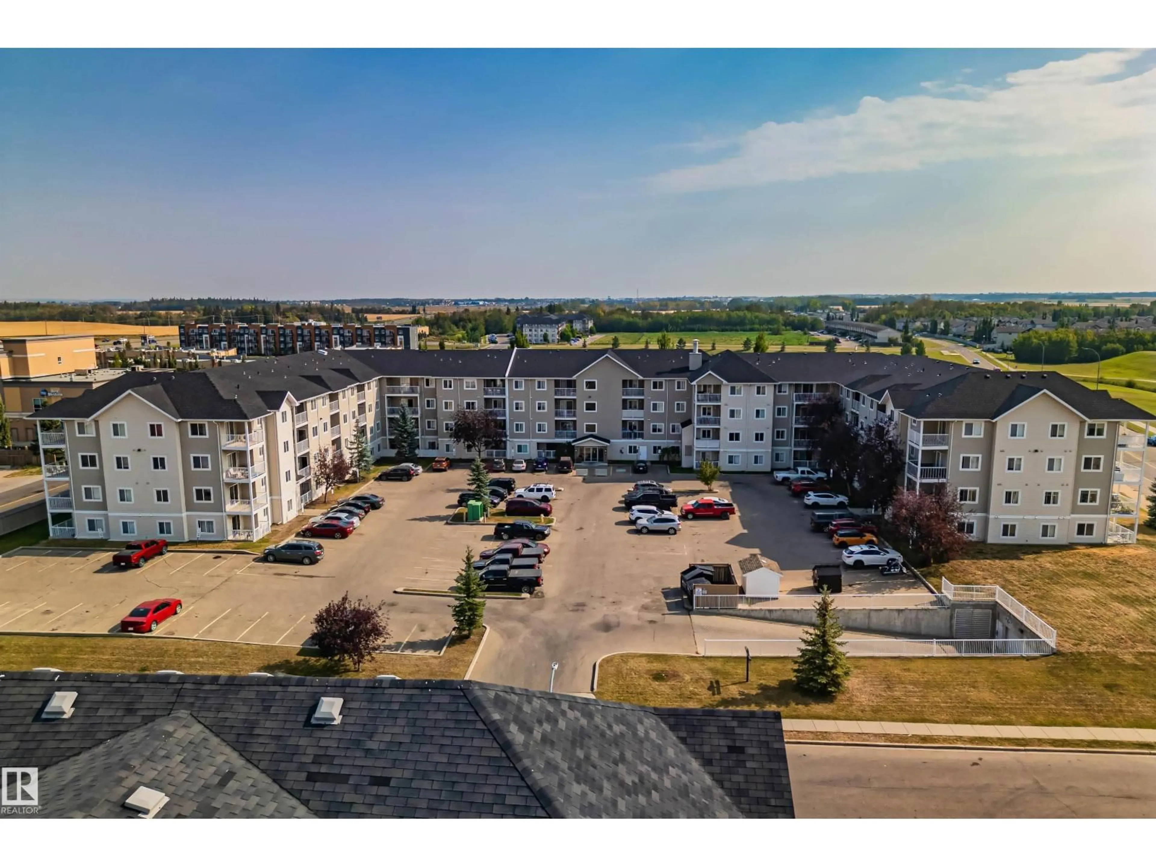 A pic from outside/outdoor area/front of a property/back of a property/a pic from drone, unknown for 232 - 4309 33 ST, Stony Plain Alberta T7Z0C4