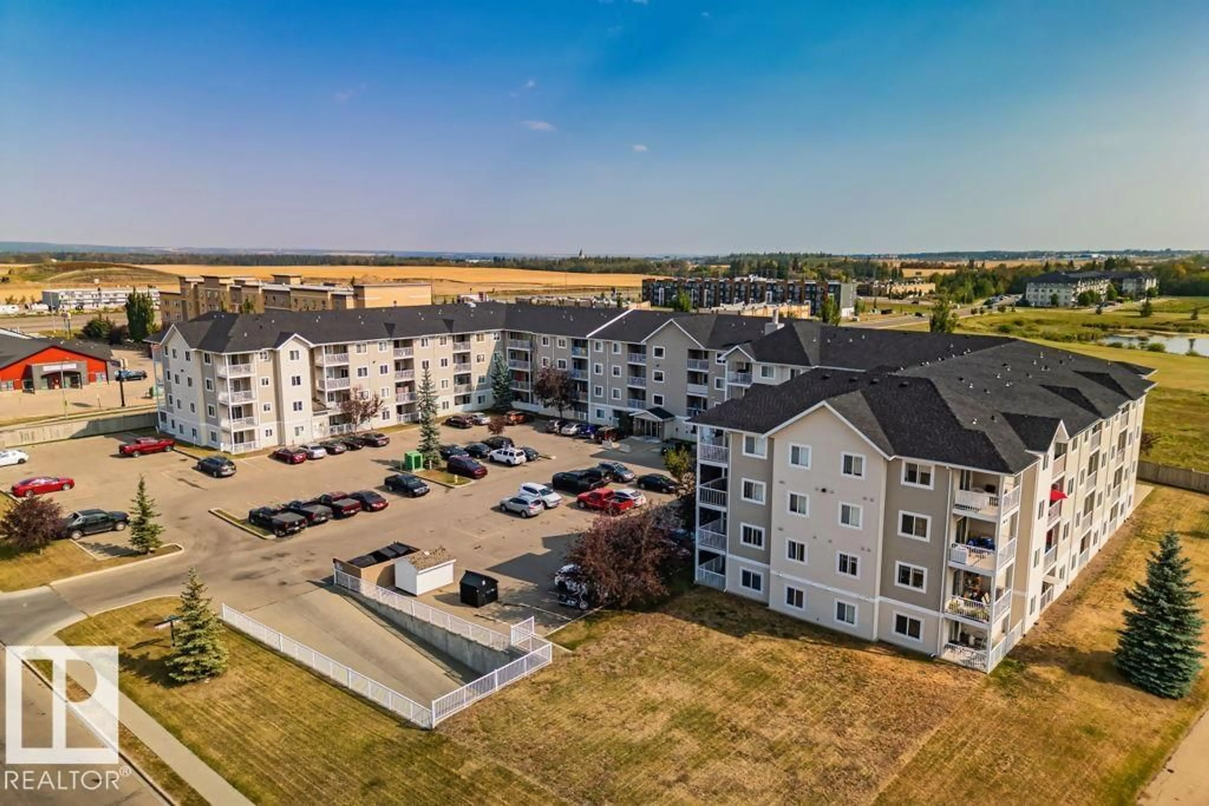 A pic from outside/outdoor area/front of a property/back of a property/a pic from drone, building for 232 - 4309 33 ST, Stony Plain Alberta T7Z0C4