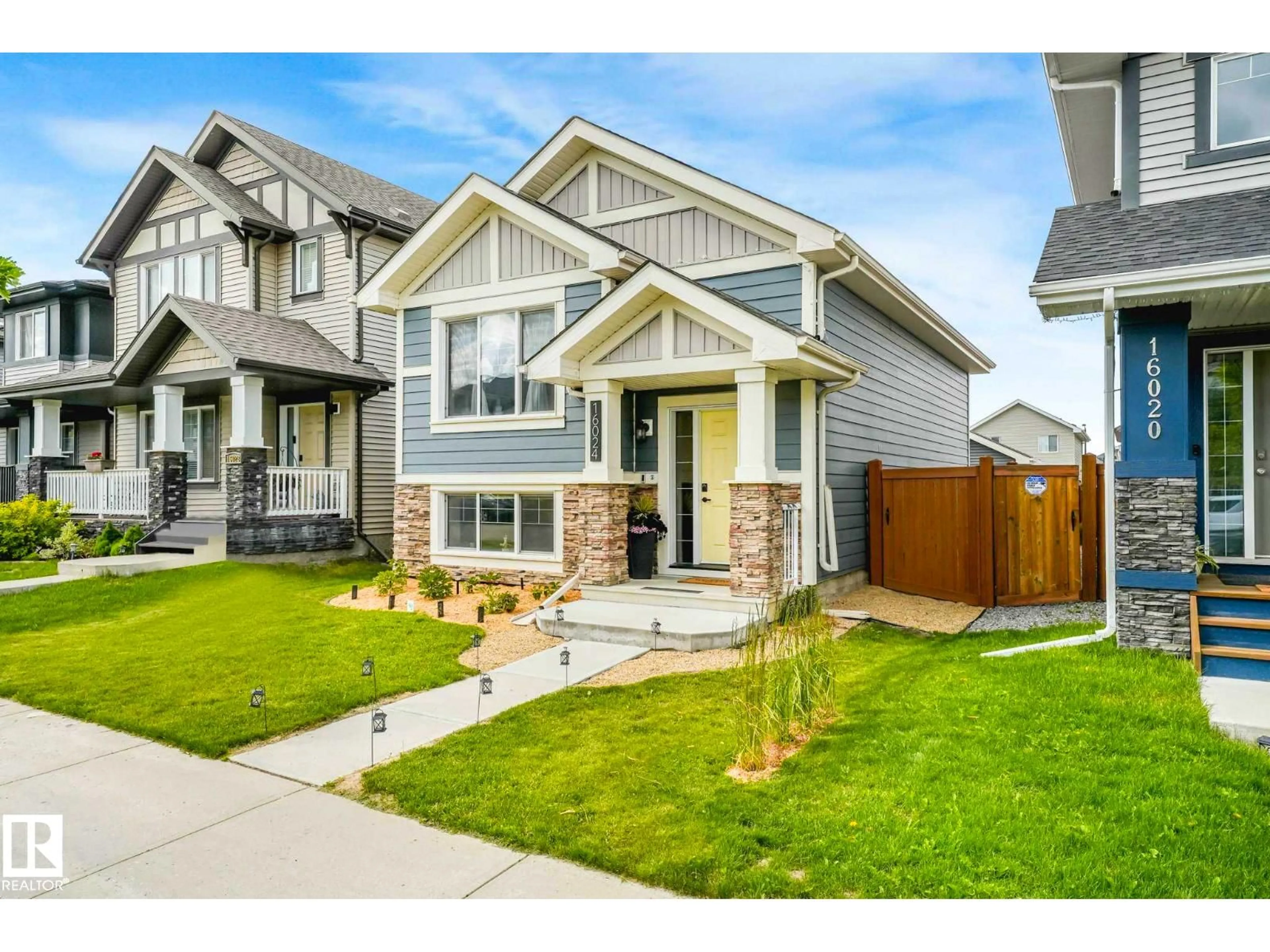 Home with vinyl exterior material, street for 16024 12 AV, Edmonton Alberta T6W2W6