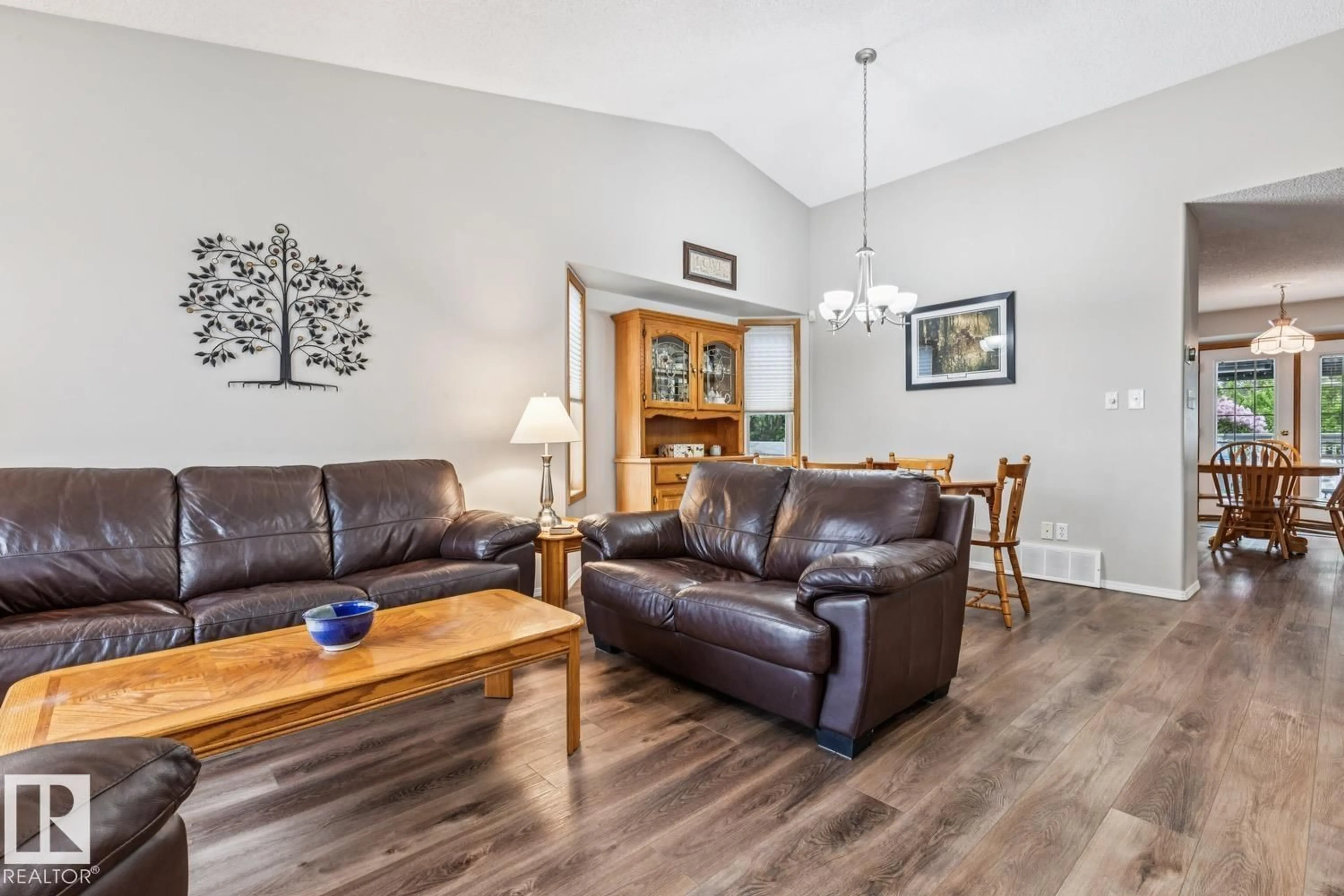 Living room with furniture, wood/laminate floor for 3623 30 ST, Edmonton Alberta T6T1K3