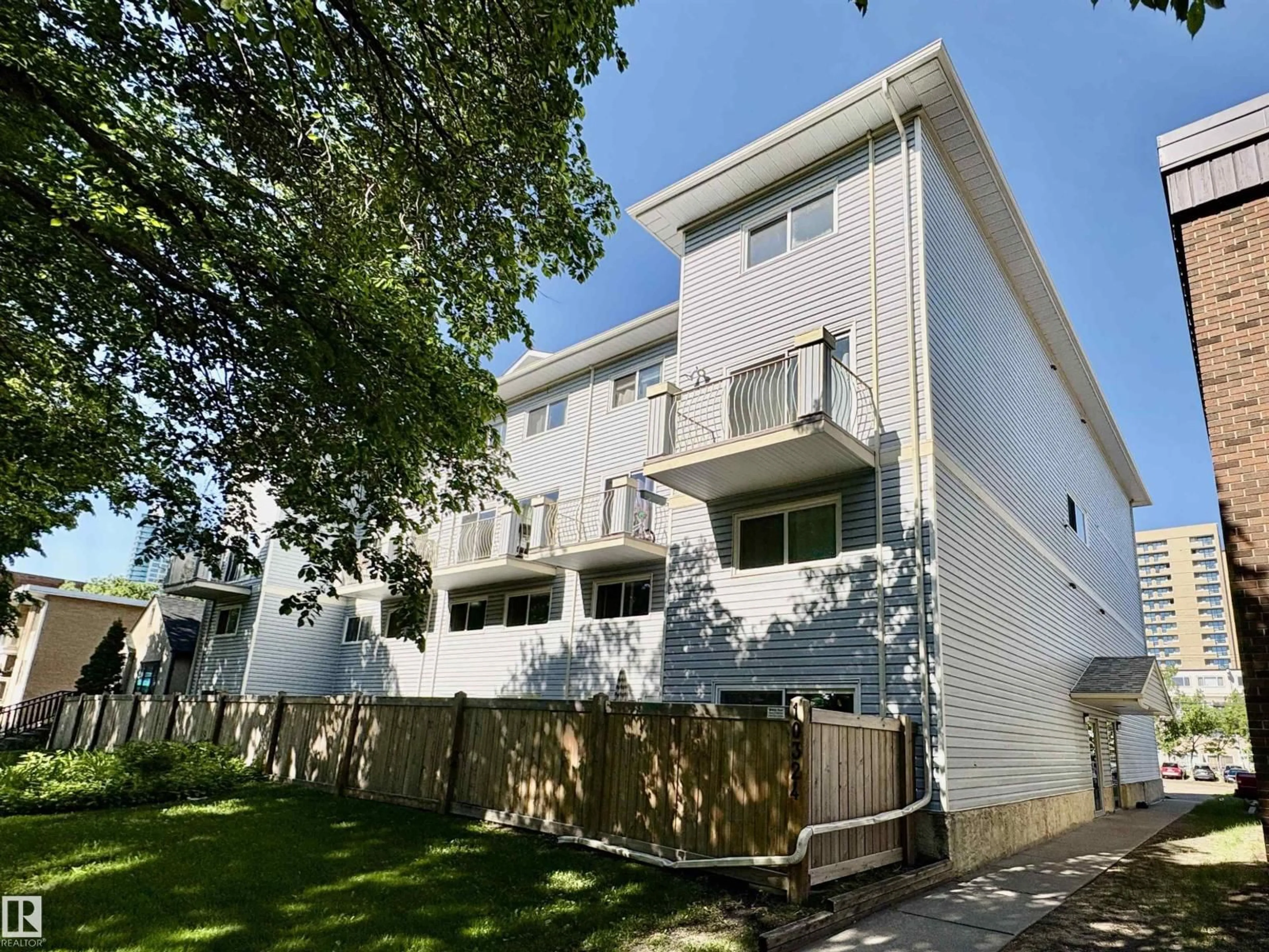 Home with vinyl exterior material, street for #3 - 10324 119 ST NW, Edmonton Alberta T5K1Z6