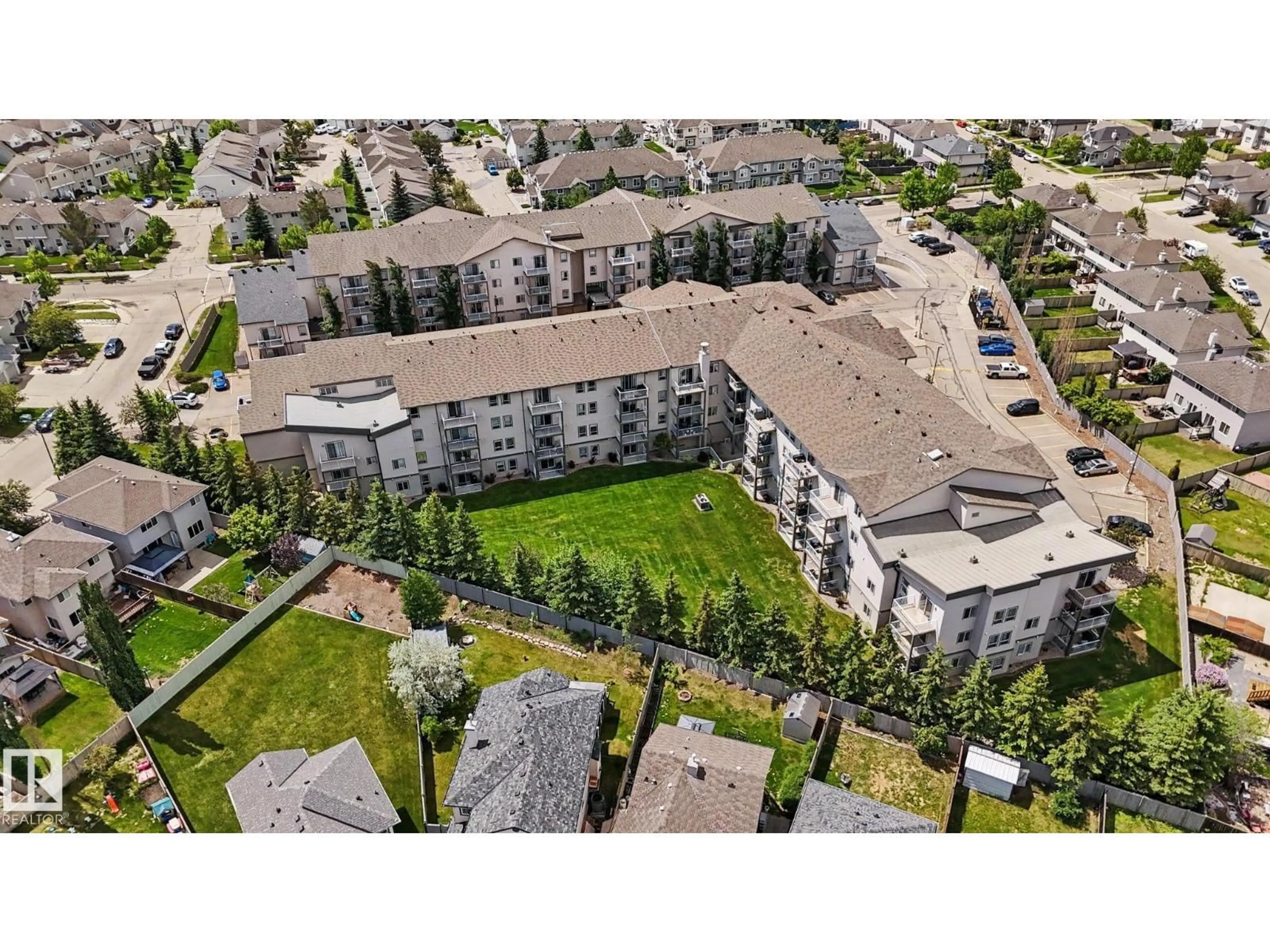A pic from outside/outdoor area/front of a property/back of a property/a pic from drone, unknown for #414 - 151 EDWARDS DR, Edmonton Alberta T6X1N5