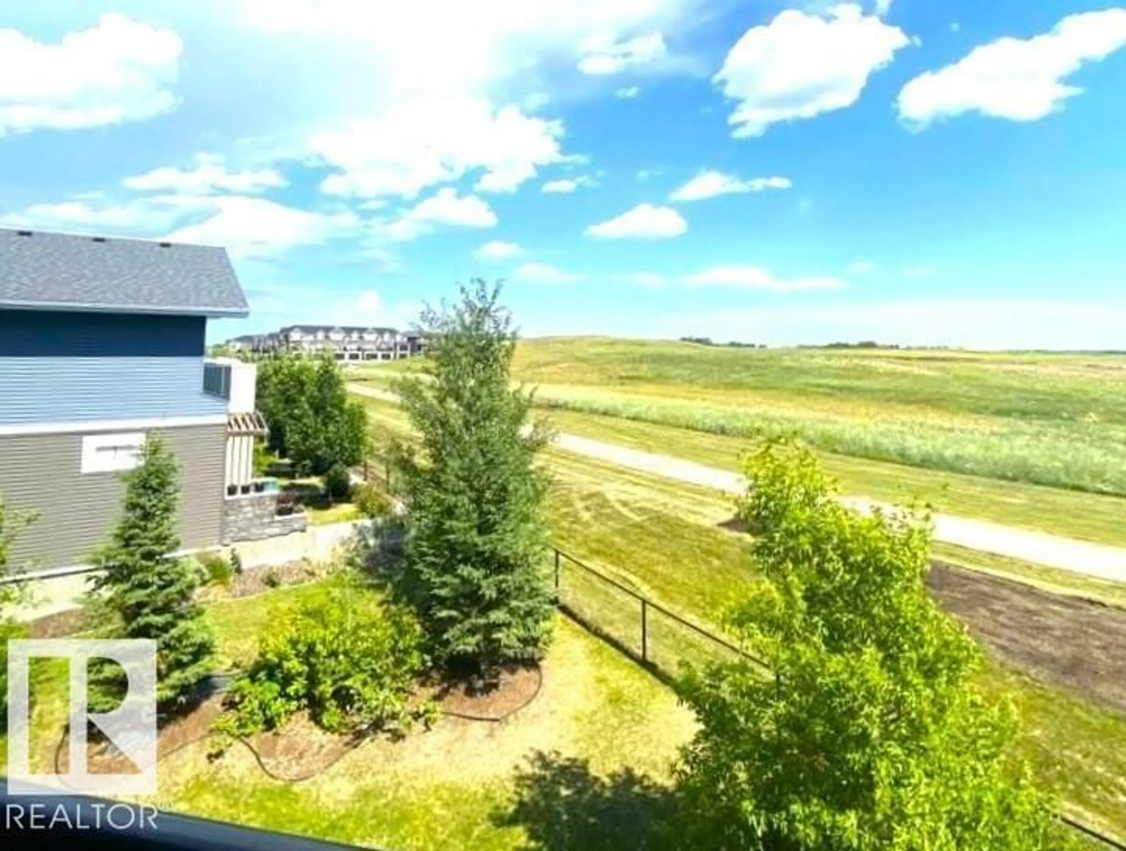 A pic from outside/outdoor area/front of a property/back of a property/a pic from drone, water/lake/river/ocean view for #313 - 1510 WATT DR, Edmonton Alberta T6X2E6