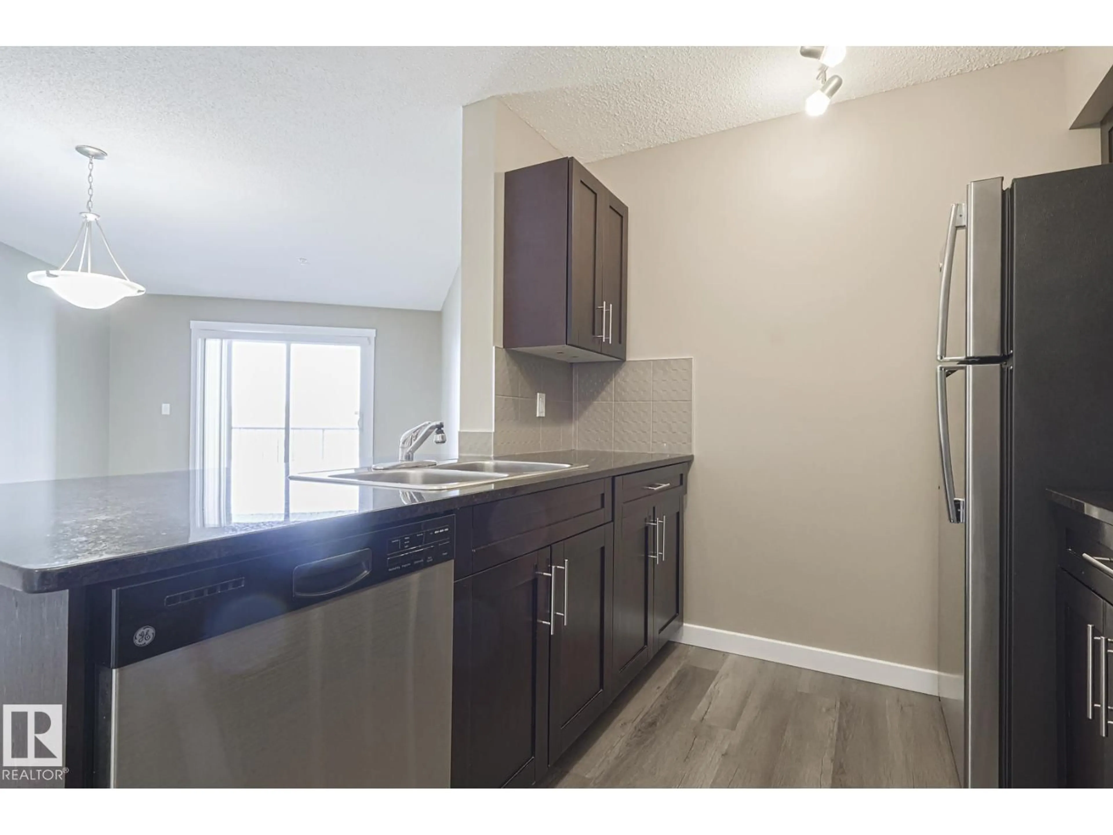 Standard kitchen, wood/laminate floor for #313 - 1510 WATT DR, Edmonton Alberta T6X2E6
