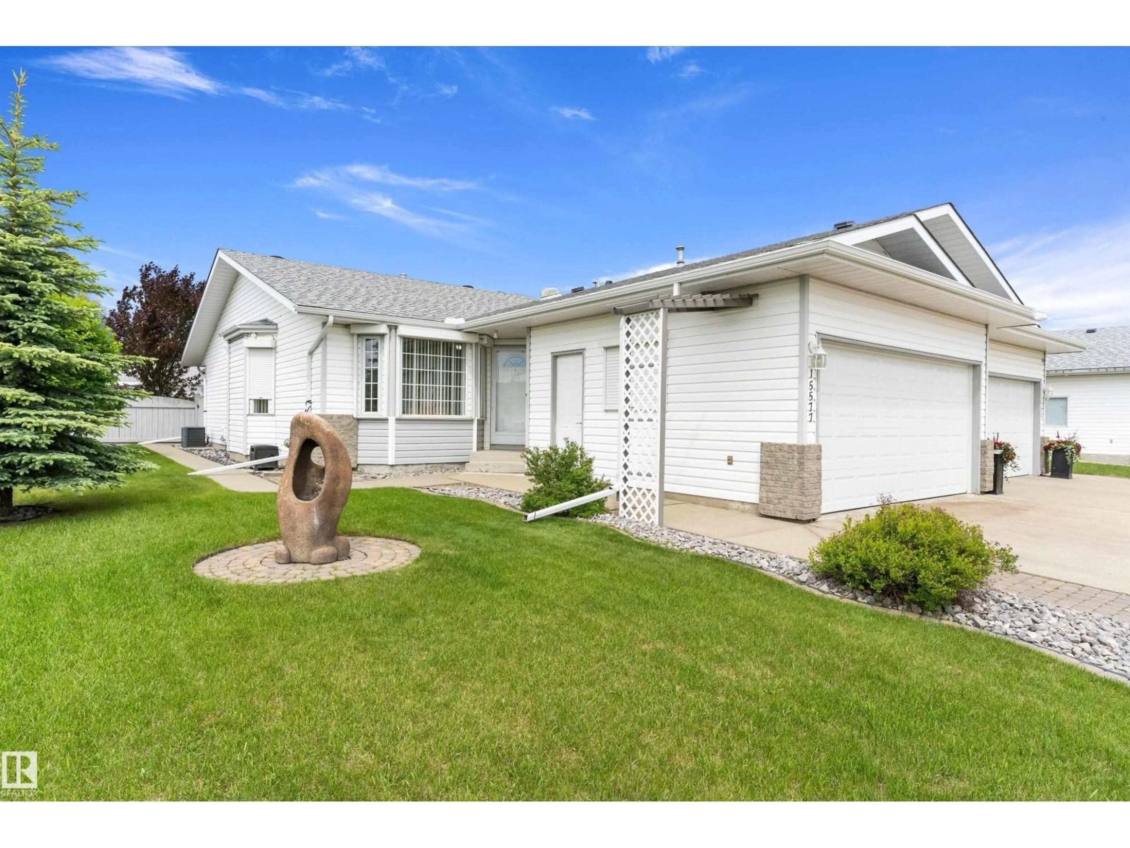 Home with vinyl exterior material, street for NW - 15577 59A ST, Edmonton Alberta T5Y2M8