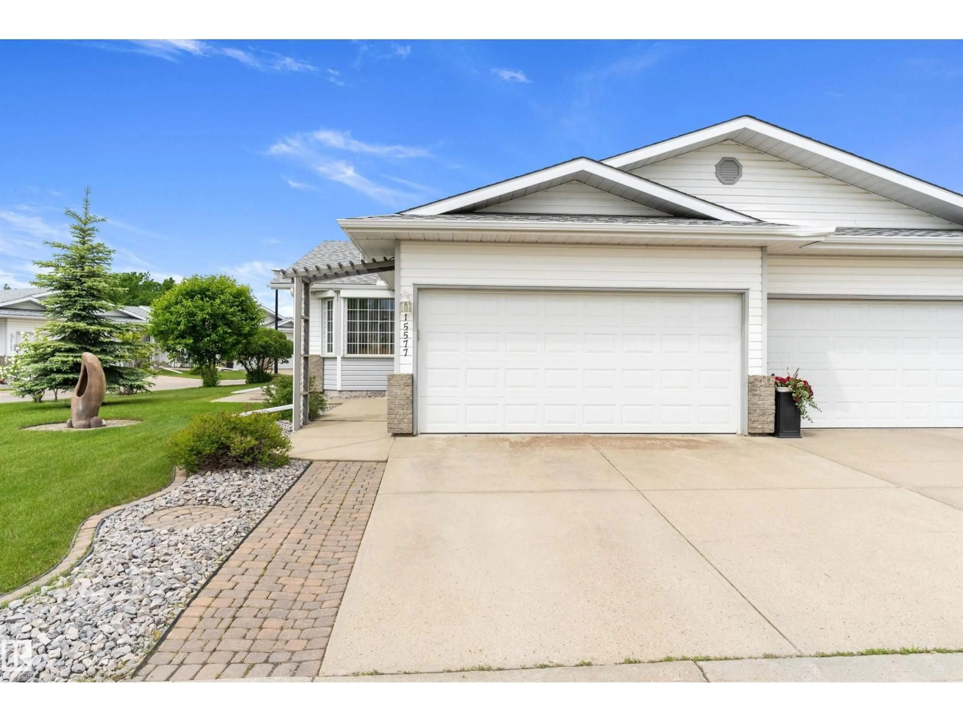 Home with vinyl exterior material, street for NW - 15577 59A ST, Edmonton Alberta T5Y2M8