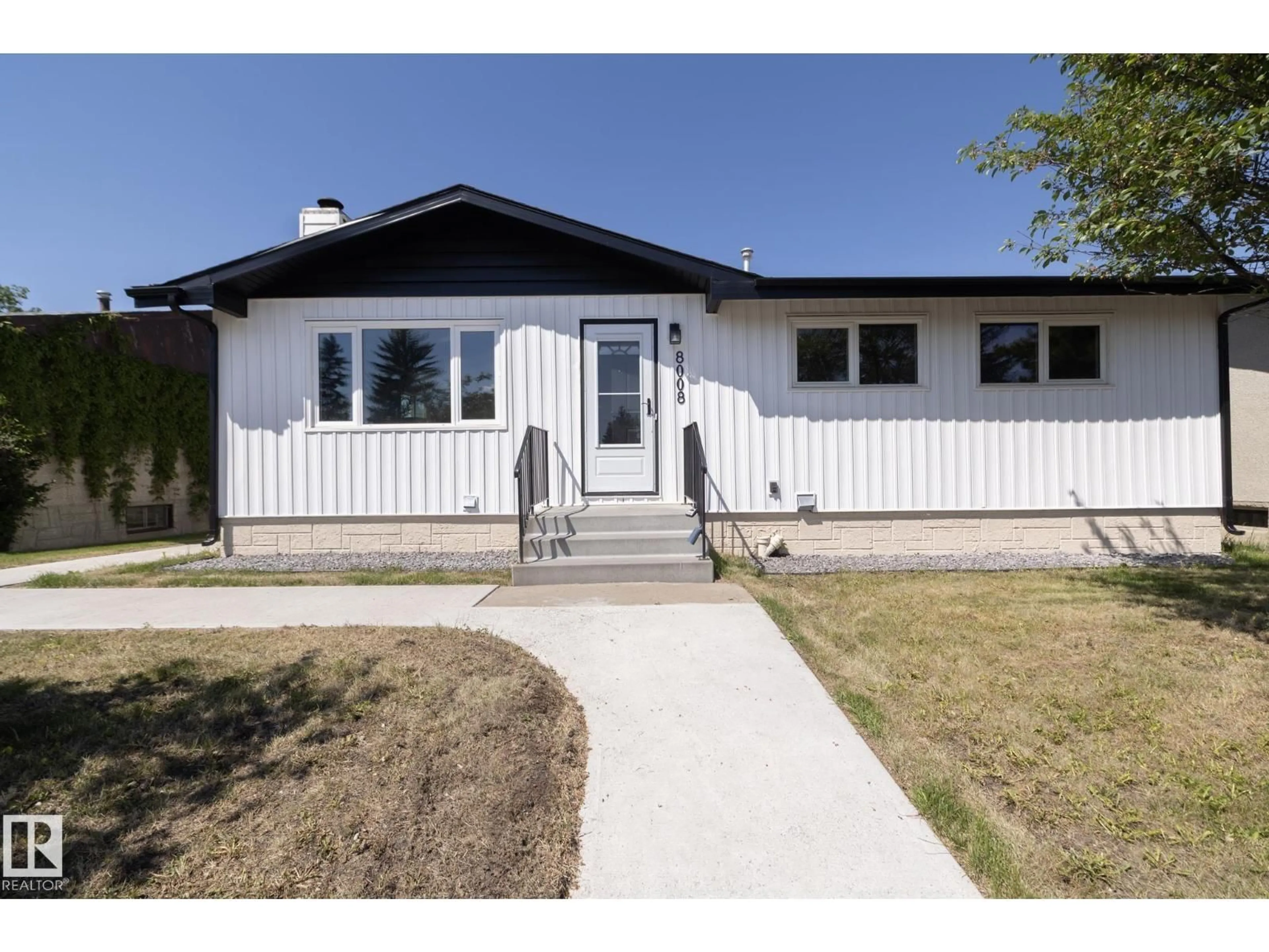 Home with vinyl exterior material, street for NW - 8008 159 ST, Edmonton Alberta T5R2E4