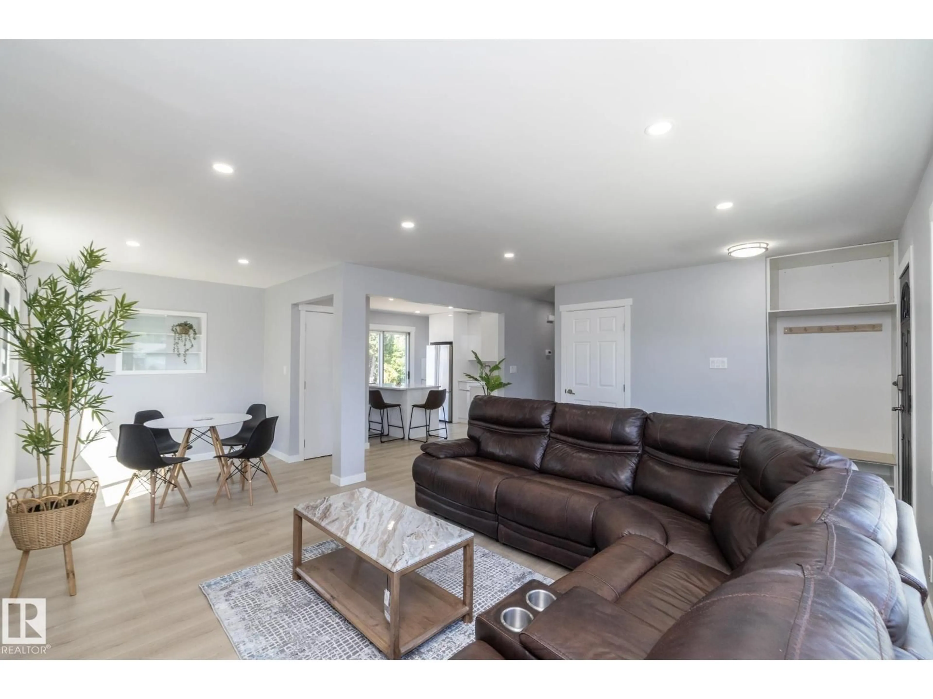 Living room with furniture, wood/laminate floor for NW - 8008 159 ST, Edmonton Alberta T5R2E4