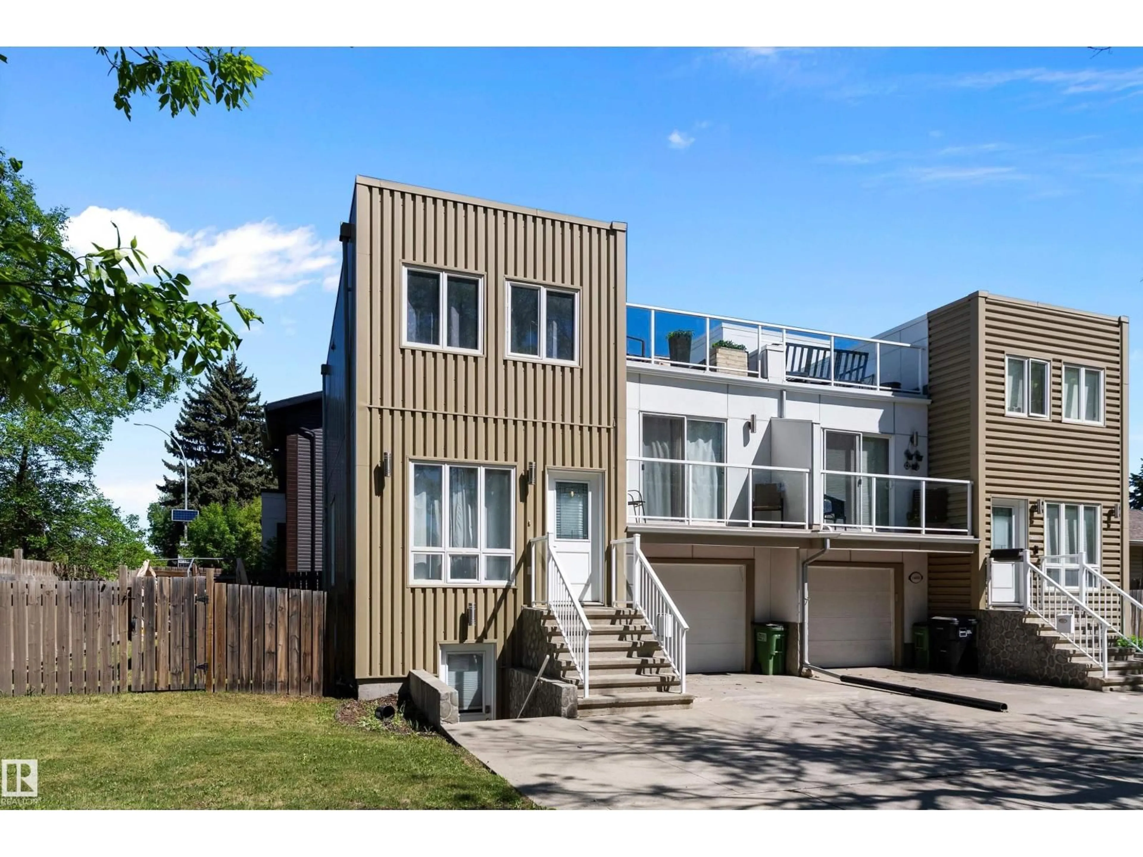 Home with vinyl exterior material, street for 14832 103 AVE, Edmonton Alberta T5N0V1
