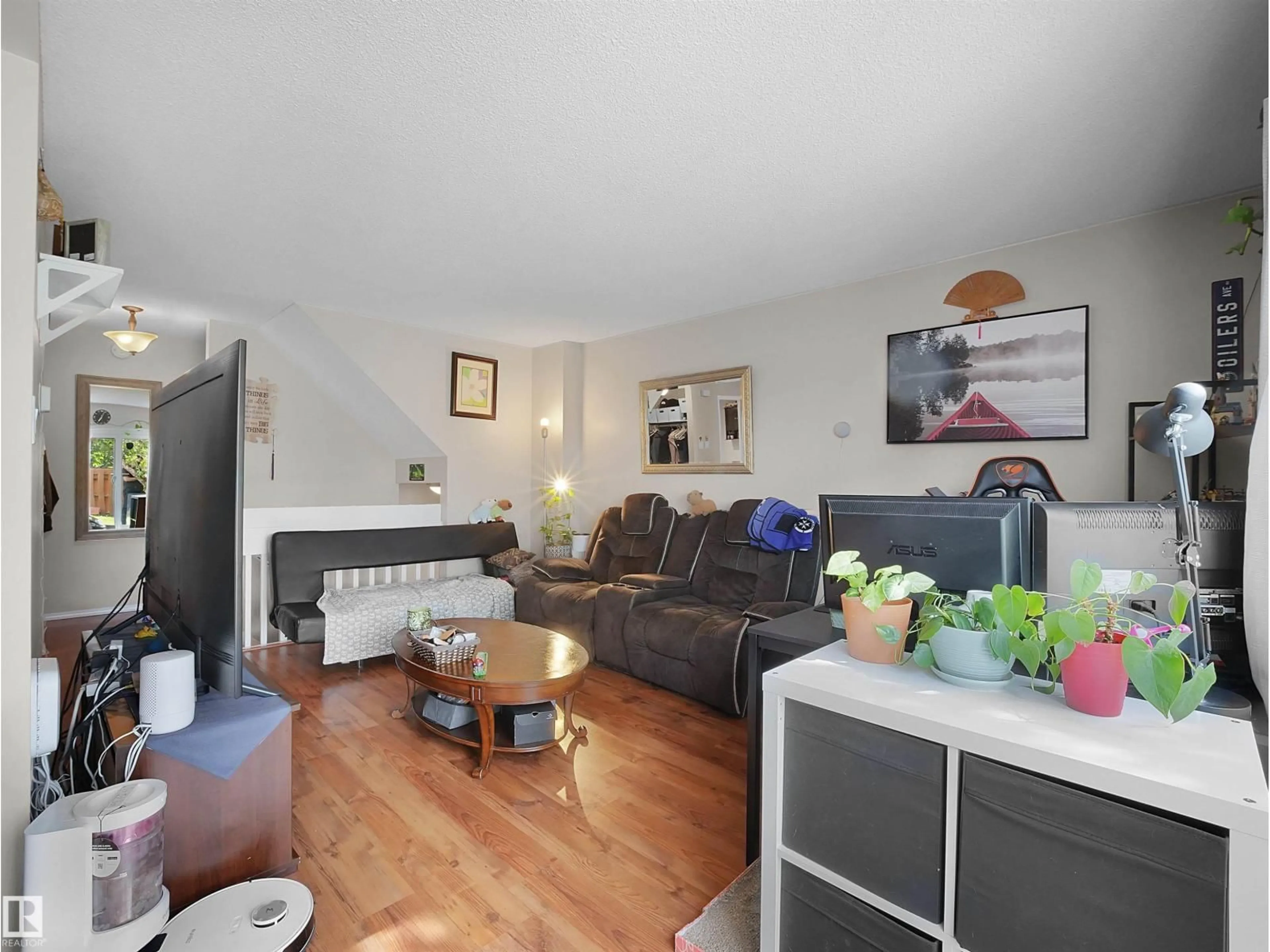 Living room with furniture, unknown for B - 16405 89 AV NW, Edmonton Alberta T5R4S1