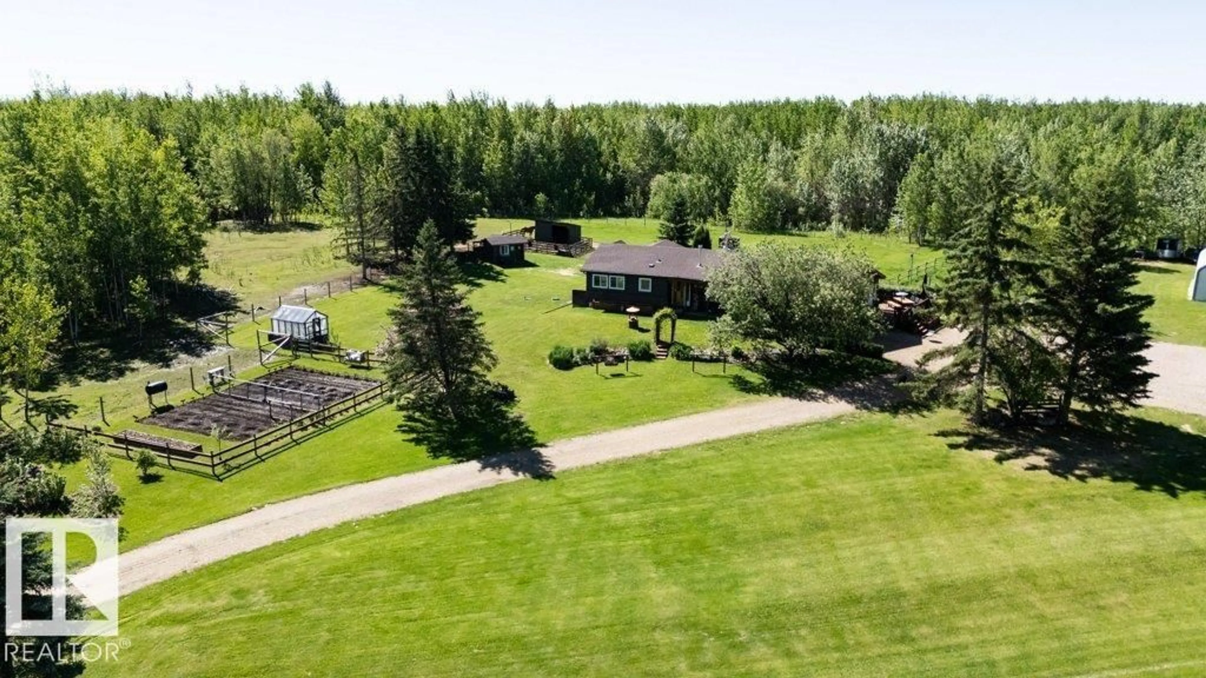A pic from outside/outdoor area/front of a property/back of a property/a pic from drone, water/lake/river/ocean view for 107 - 59329 RGE RD 51, Rural Barrhead County Alberta T7N1N8