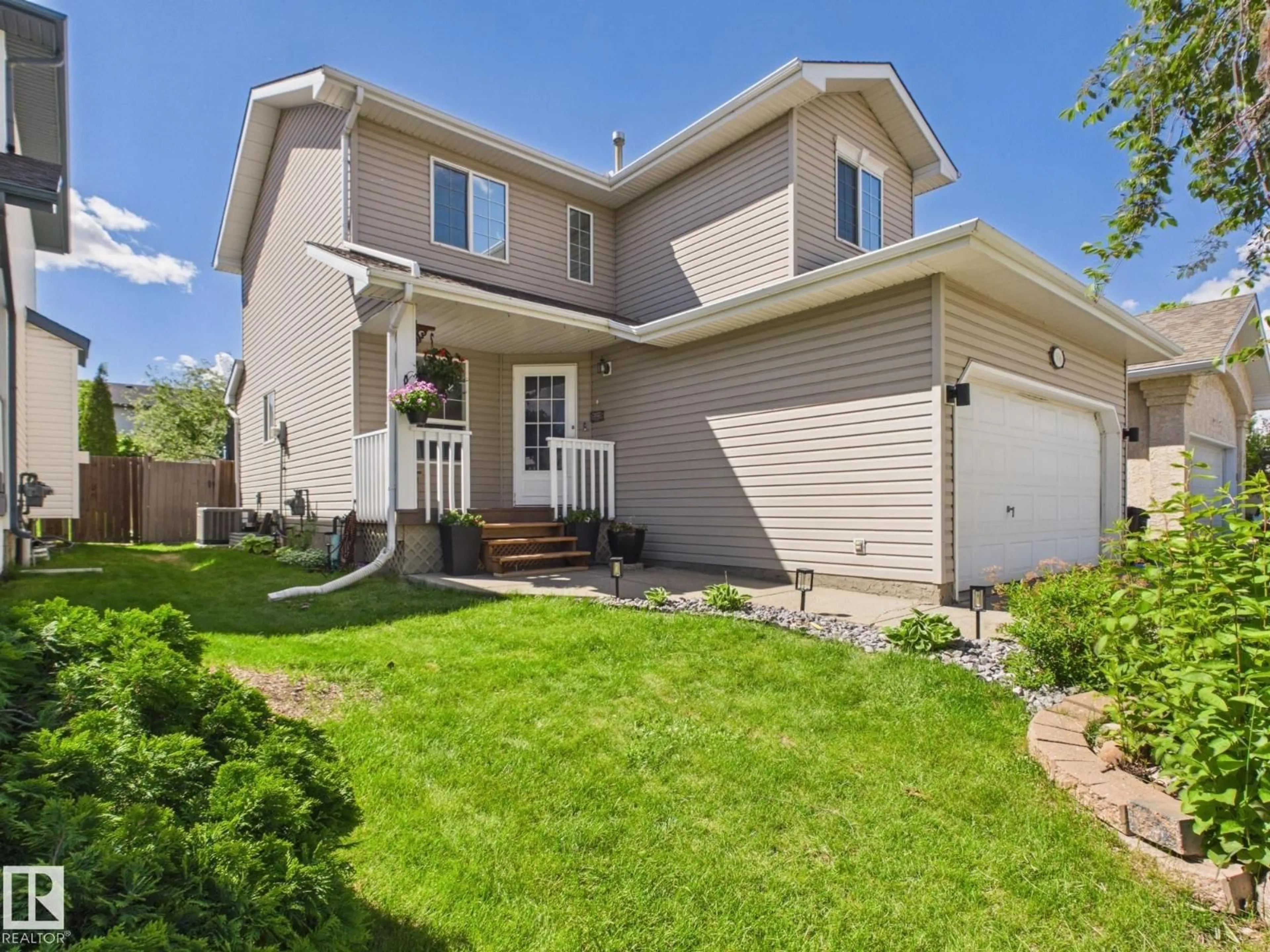 Home with vinyl exterior material, street for 506 BEVINGTON CL, Edmonton Alberta T5T6G3