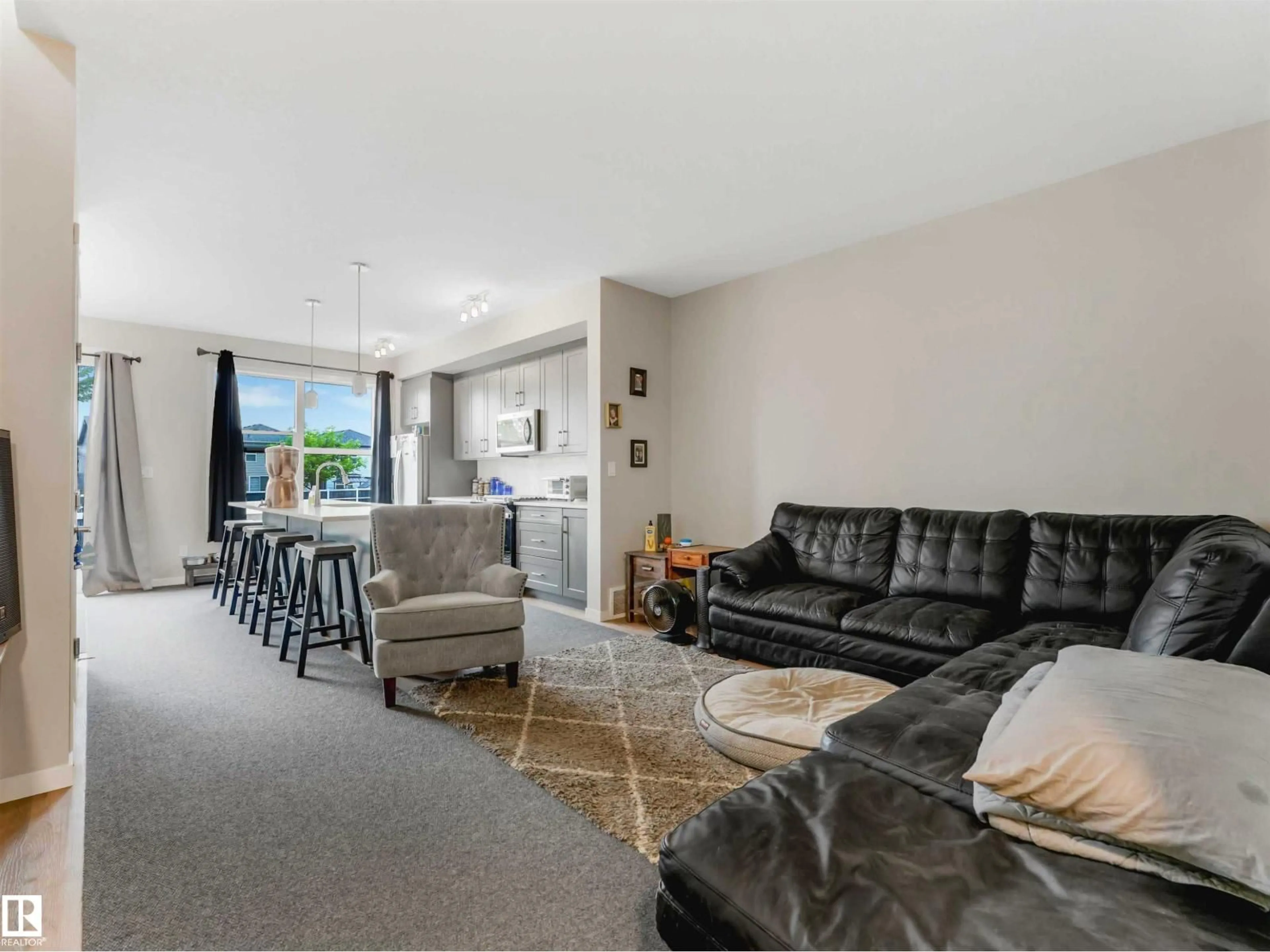 Living room with furniture, unknown for 15146 26 ST, Edmonton Alberta T5Y2G8