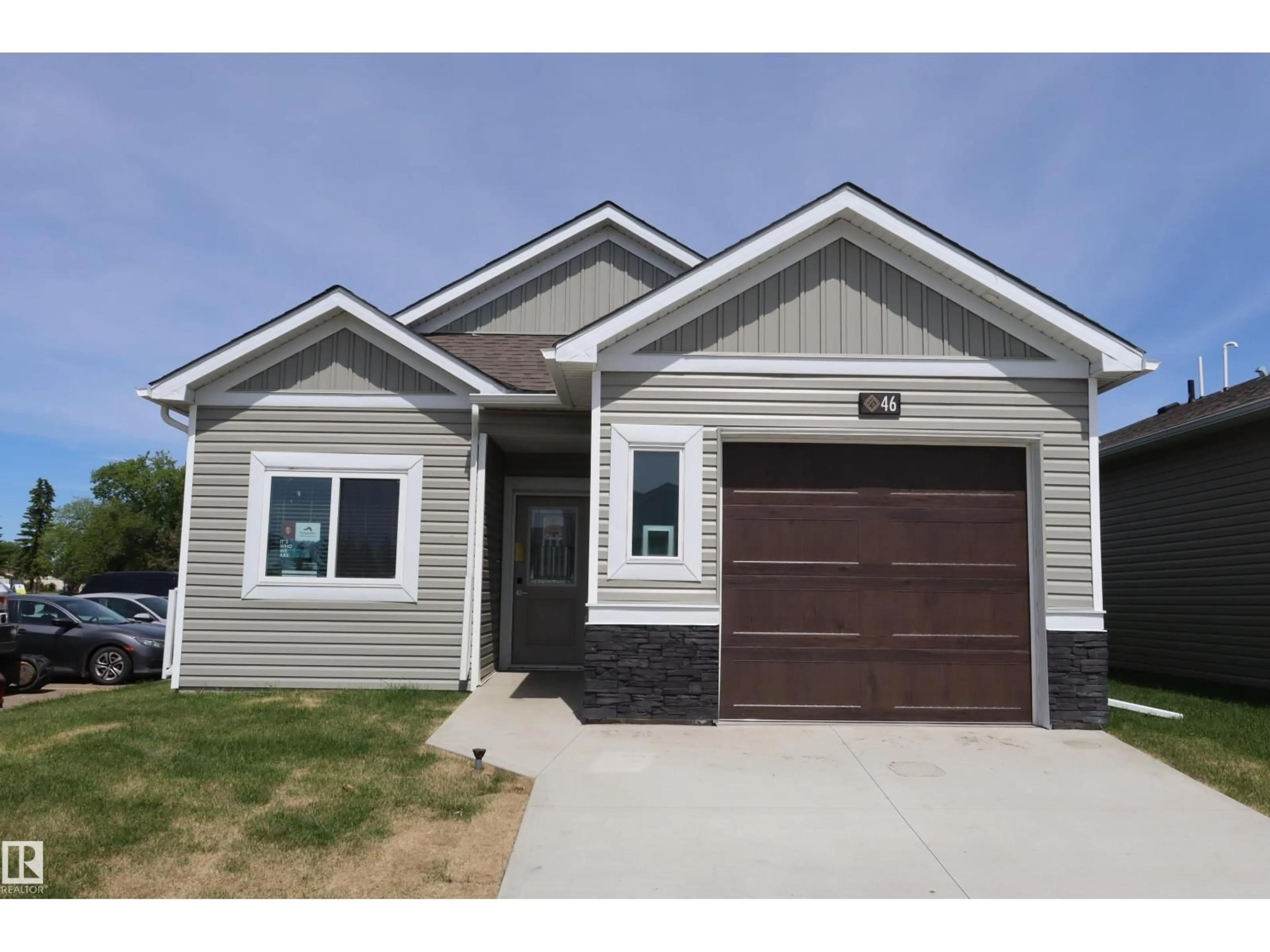 Home with vinyl exterior material, street for #46 - 6519 46 ST, Wetaskiwin Alberta T9A1Y5