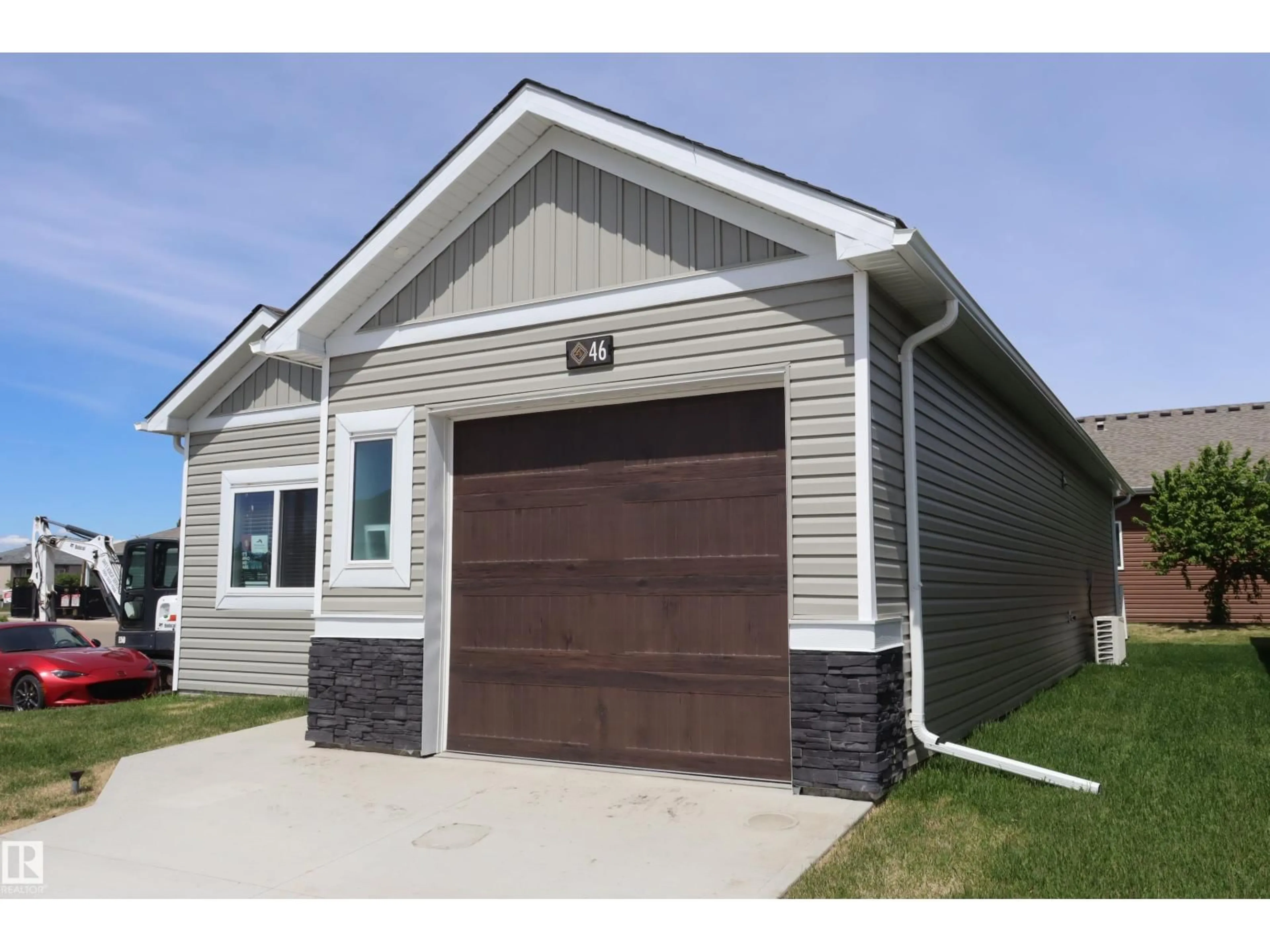Home with vinyl exterior material, street for #46 - 6519 46 ST, Wetaskiwin Alberta T9A1Y5