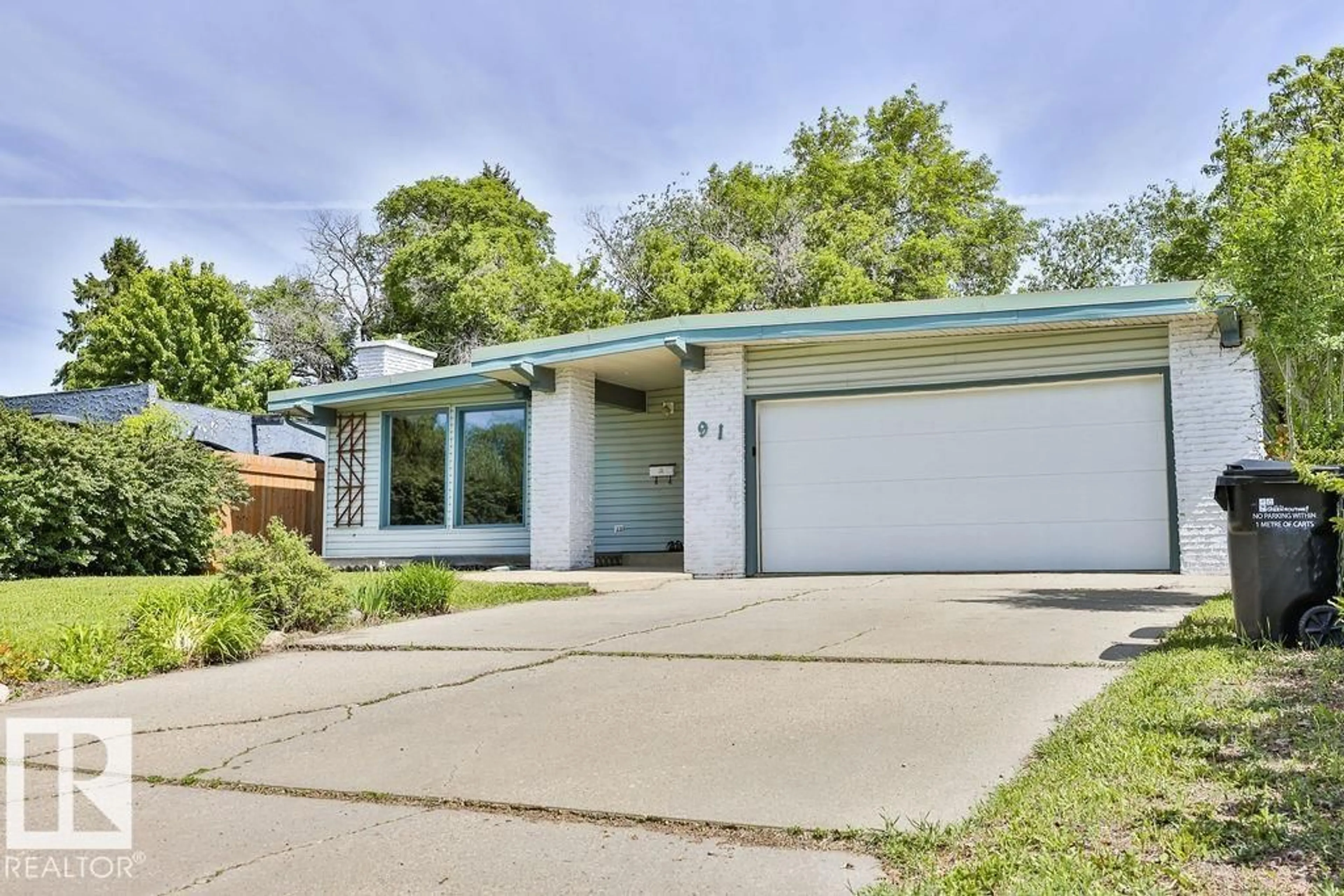 Home with vinyl exterior material, street for 91 MAIN BV, Sherwood Park Alberta T8H2H1